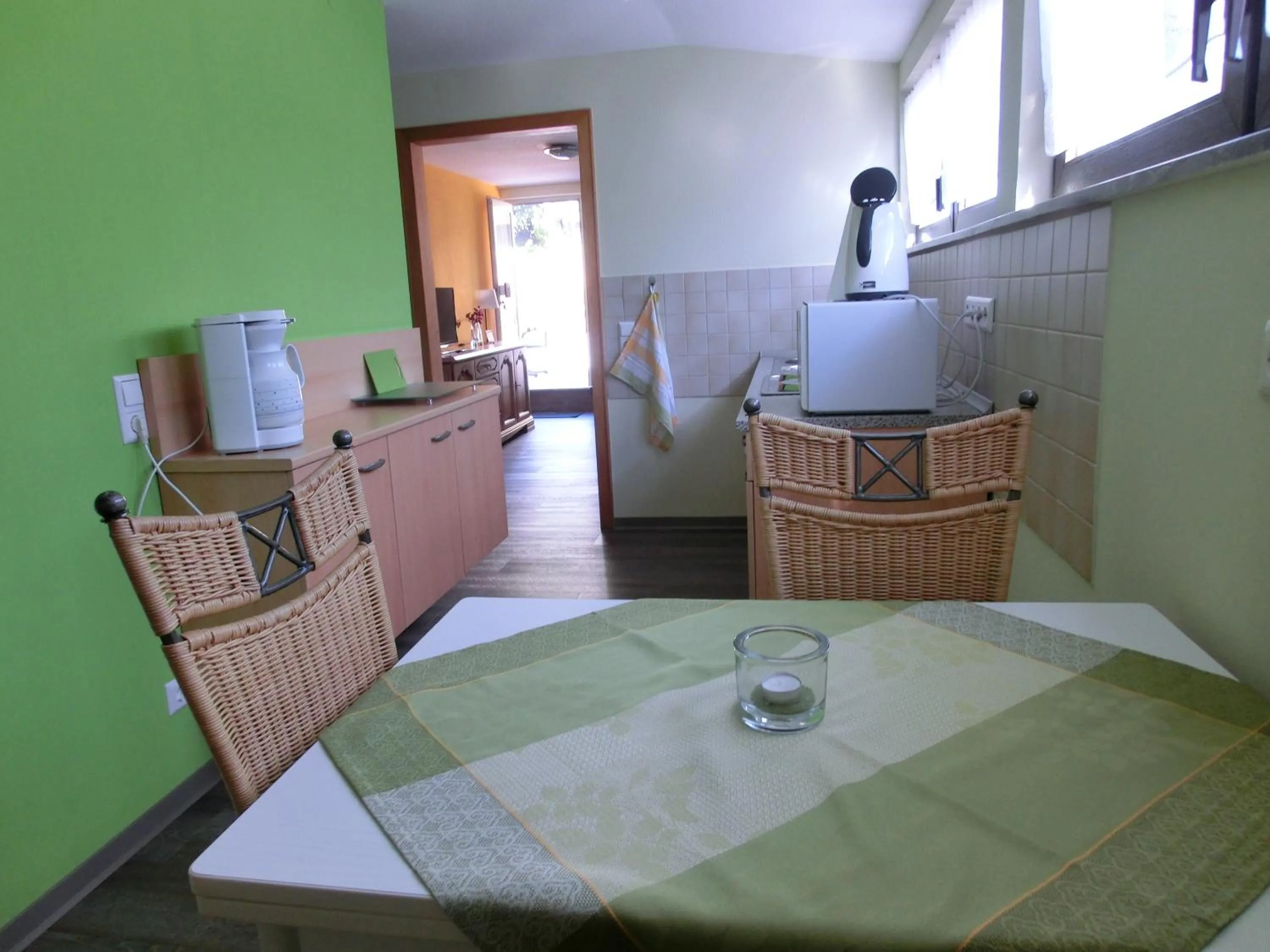 Kitchen or kitchenette in Ferienwohnung Rivaner