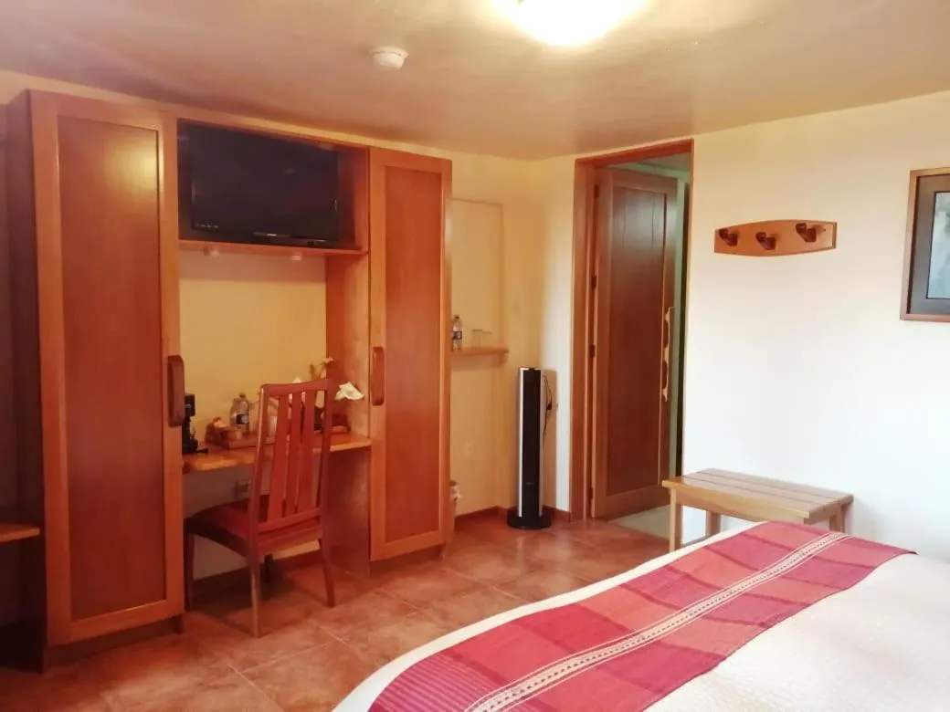 Bed in Casa Tsaya Hotel Boutique