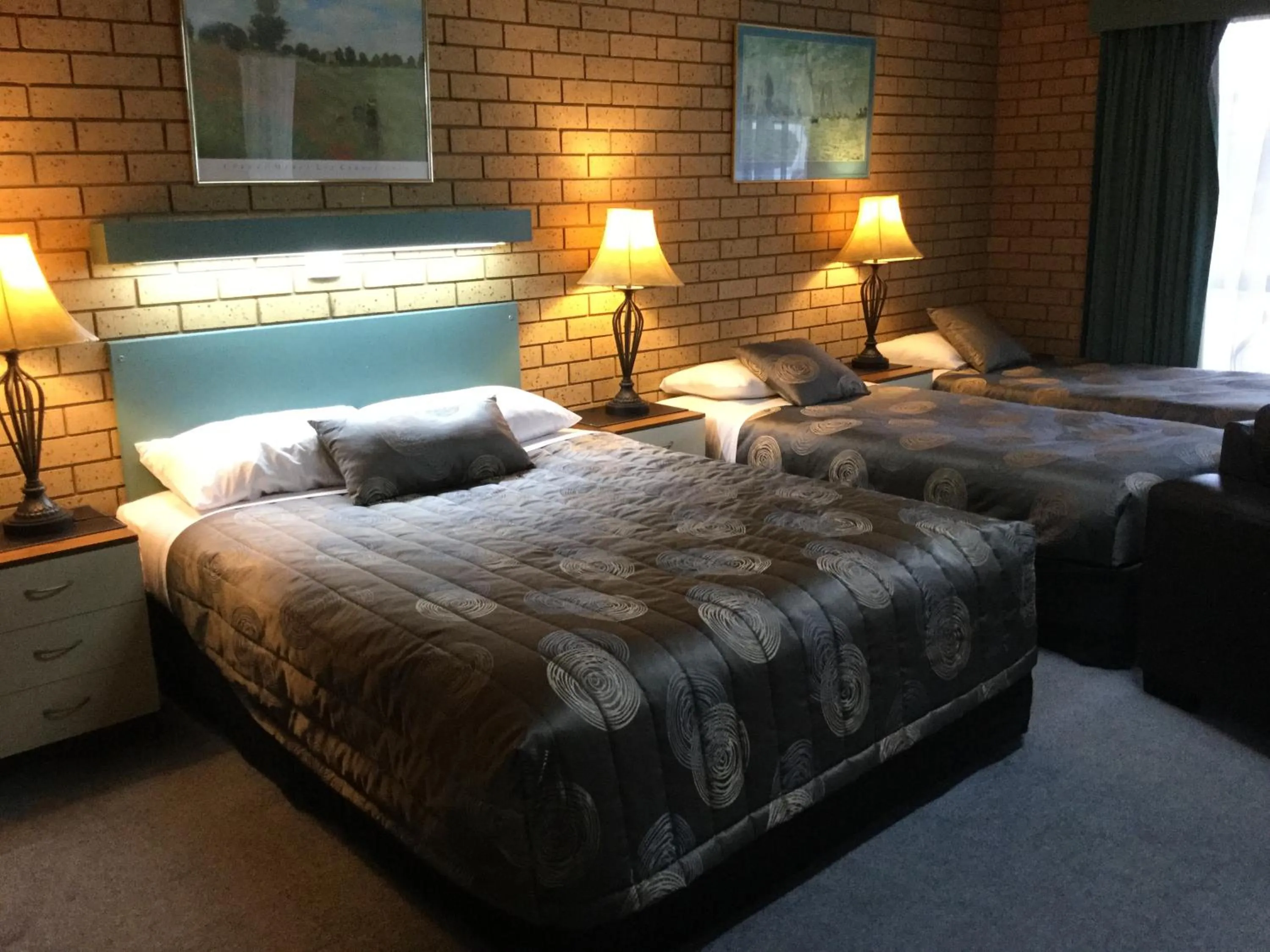 Bed in Sunrise Motel