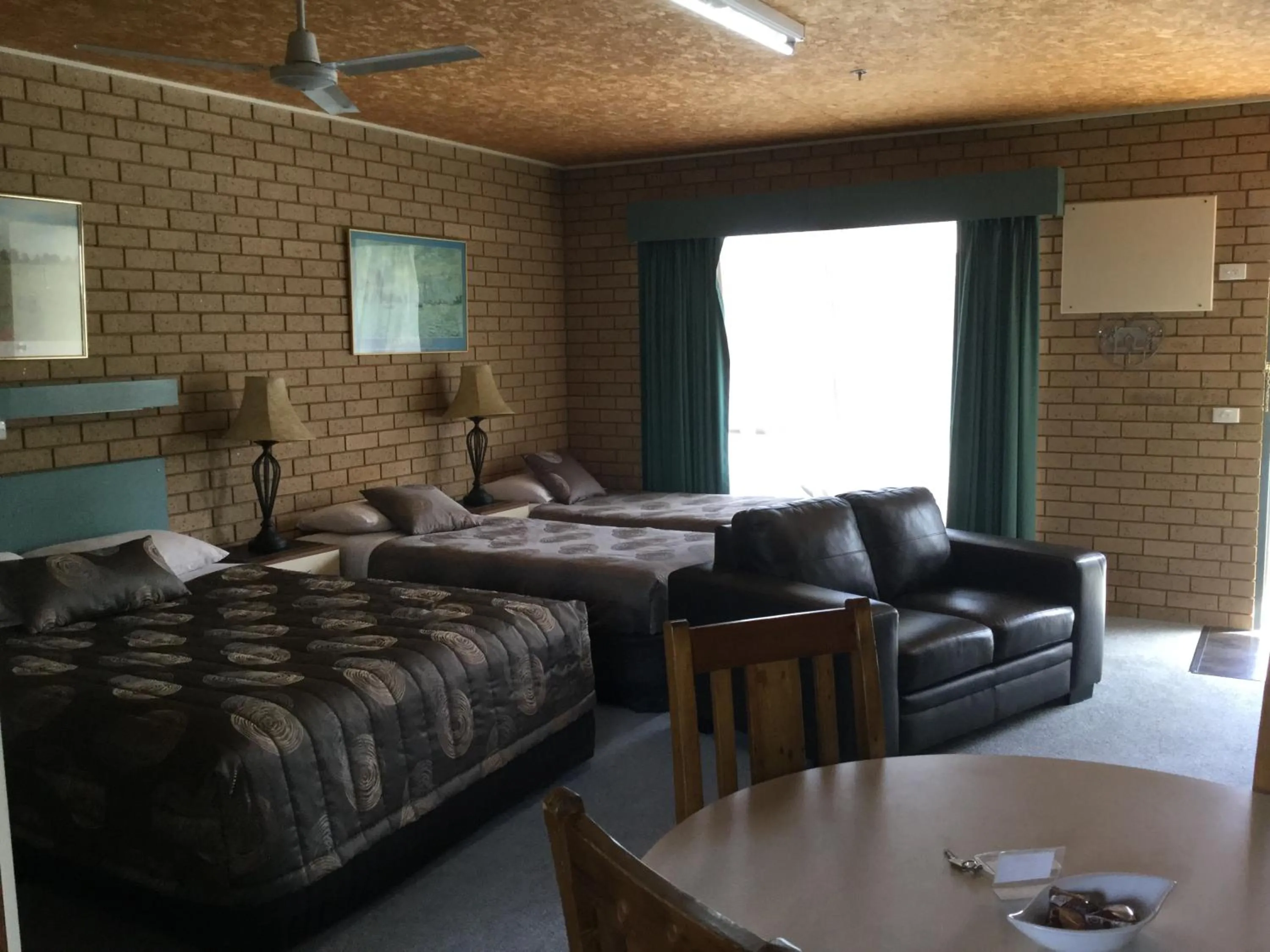 Bed in Sunrise Motel