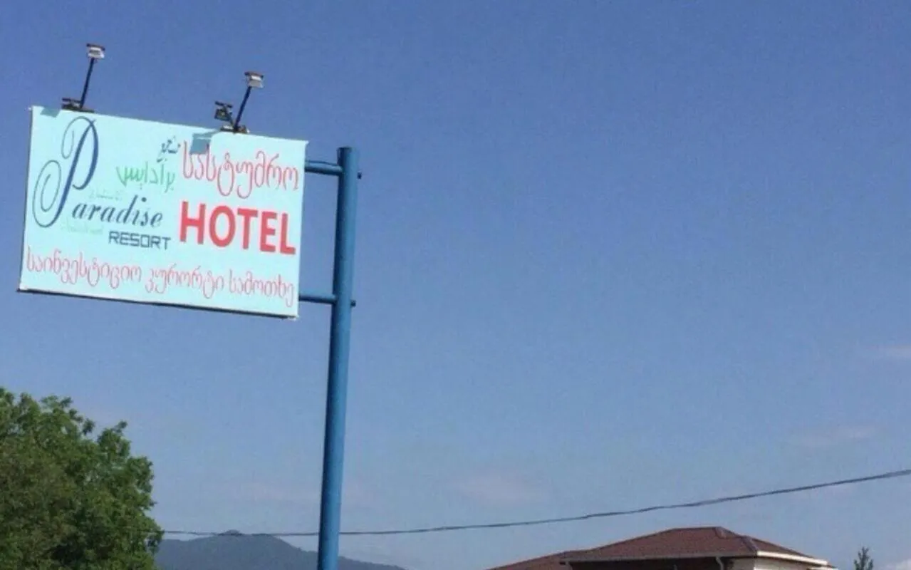 Property logo or sign in Paradise Investment Resort