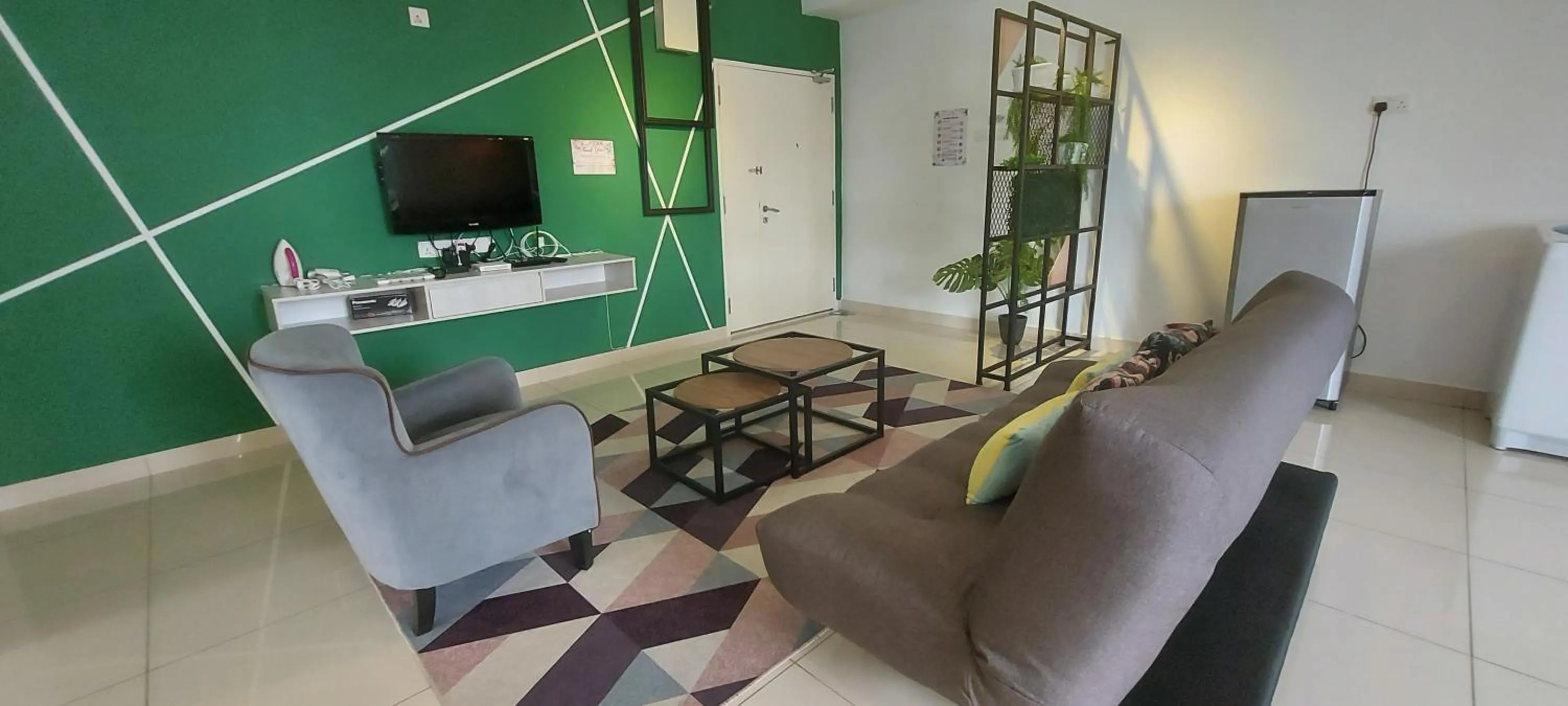 Living room in Merlene Suites at Mansion One Formerly know as Mansion One Suites