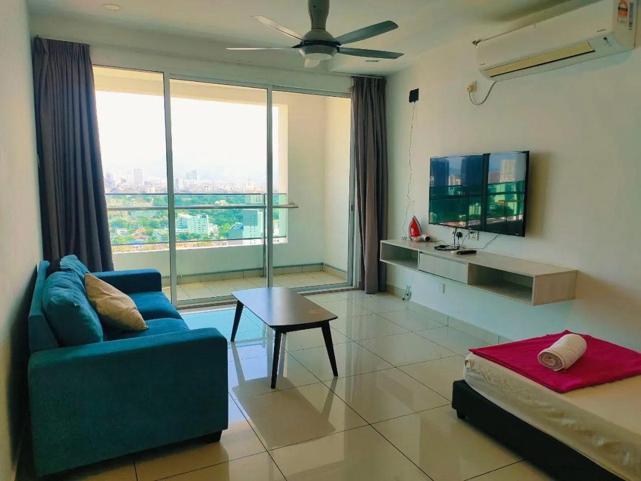 Living room in Merlene Suites at Mansion One Formerly know as Mansion One Suites