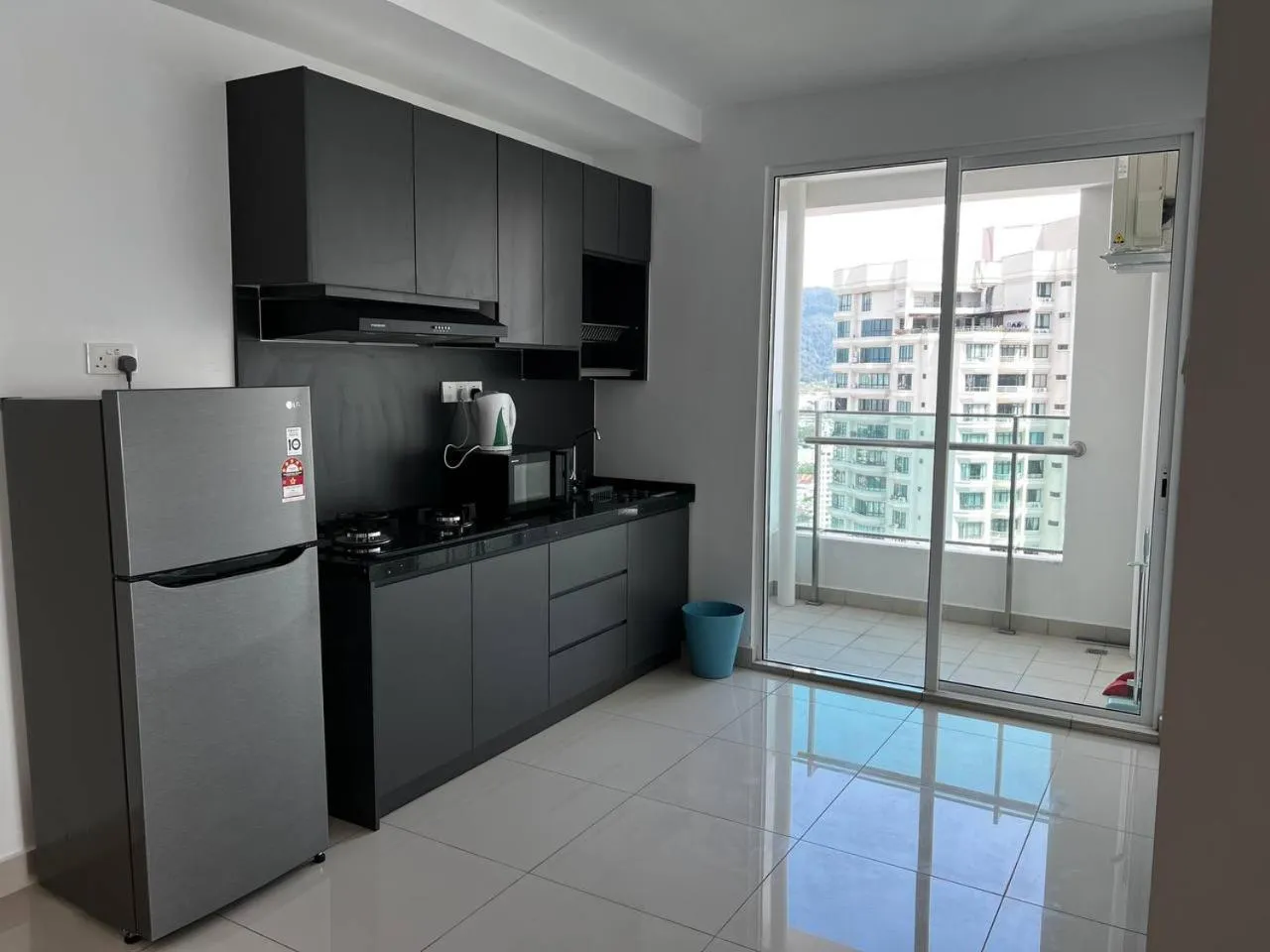 Kitchen or kitchenette in Merlene Suites at Mansion One Formerly know as Mansion One Suites