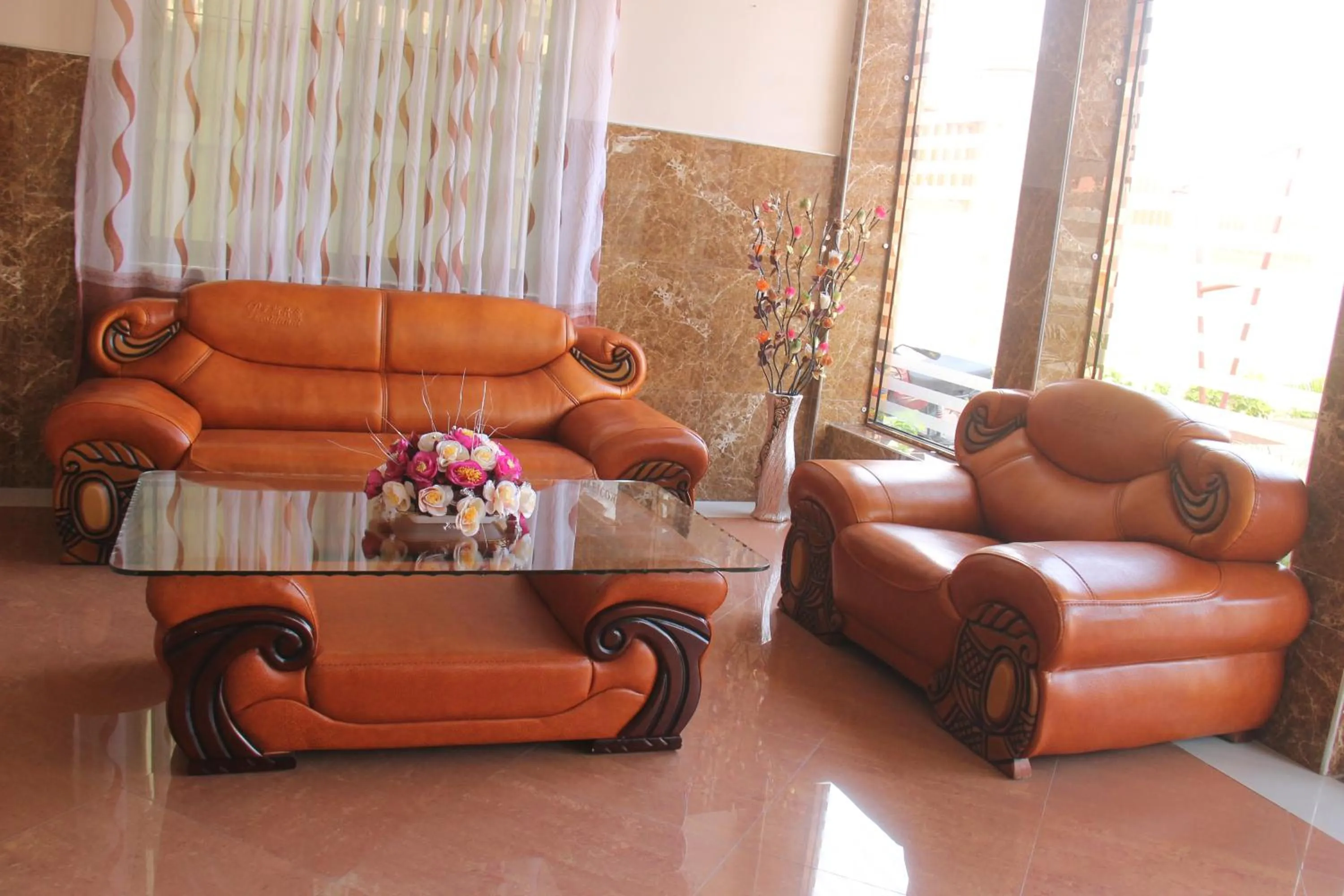 Communal lounge/ TV room in Silver Paradise Hotel