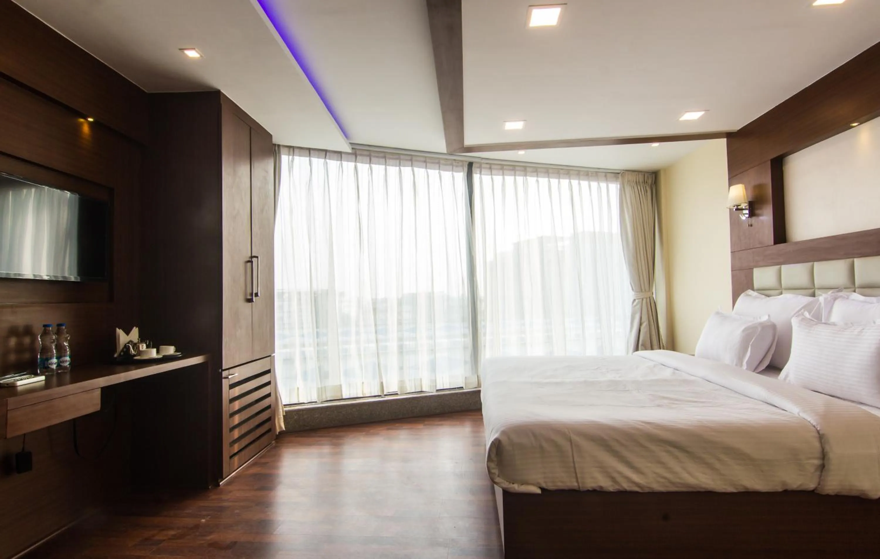 Bed in Hotel Sawood International