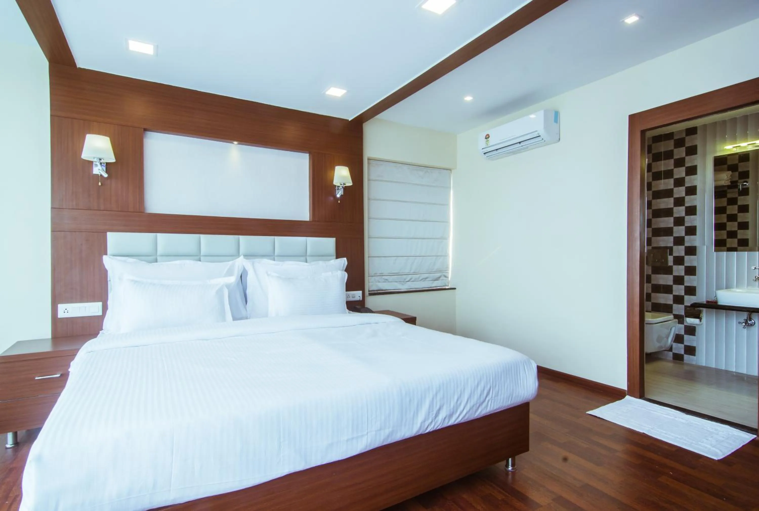 Bed in Hotel Sawood International