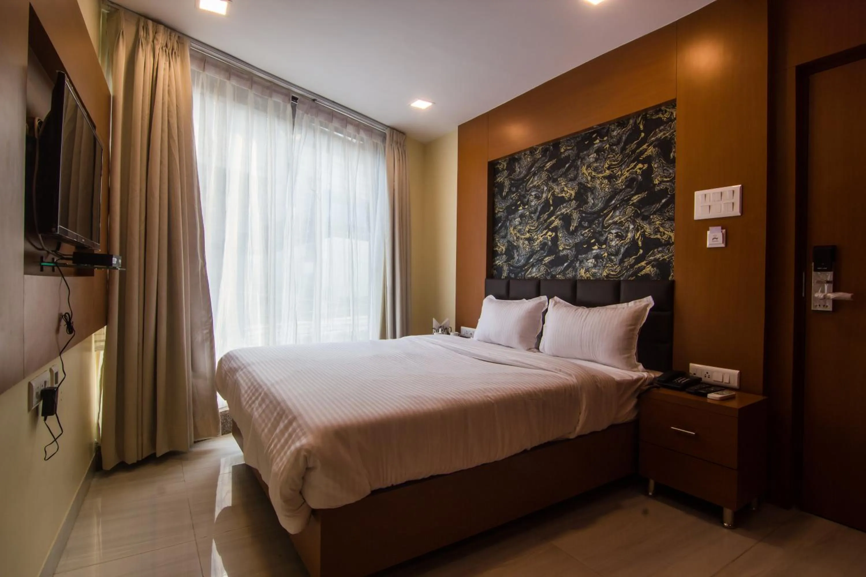 Bed in Hotel Sawood International