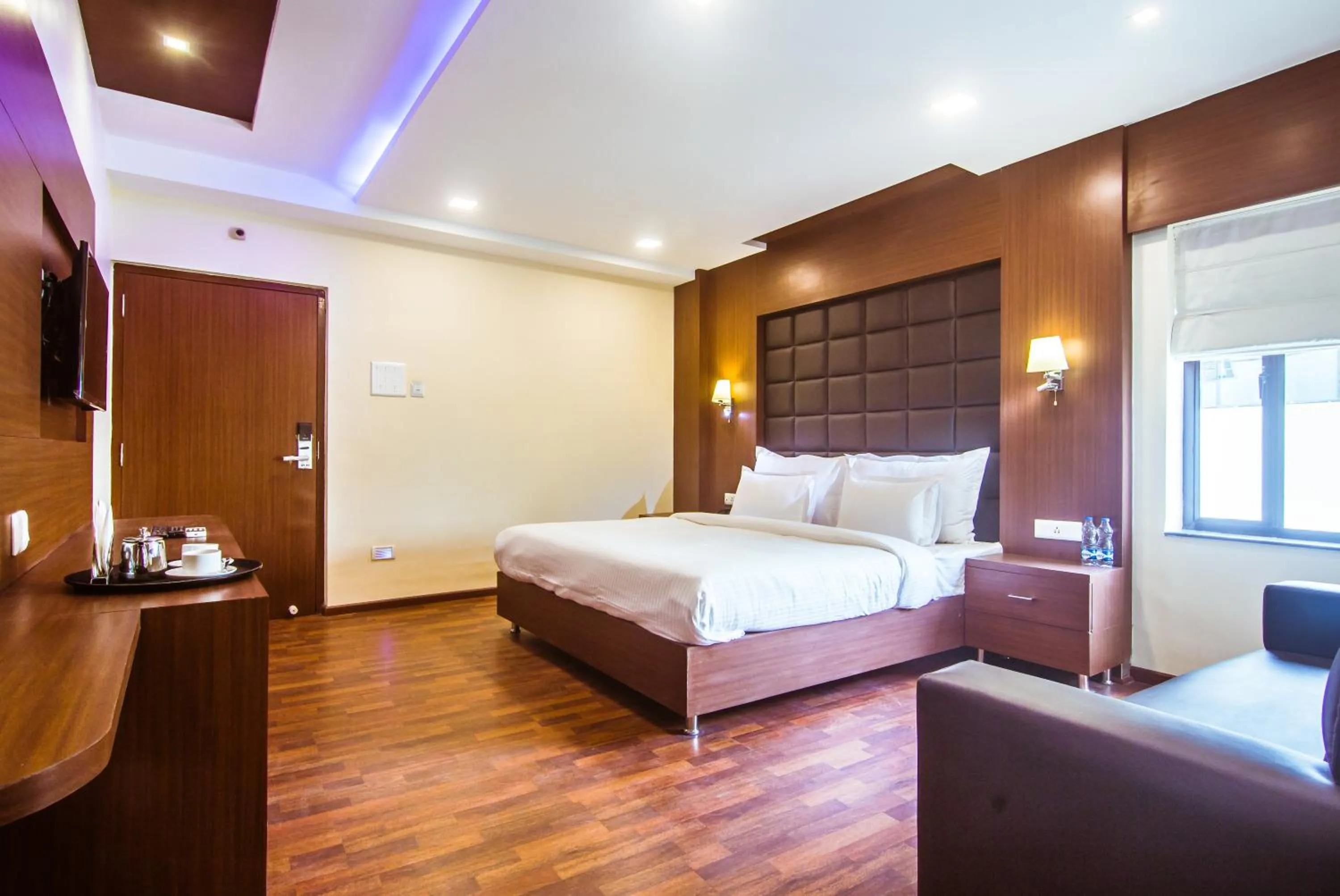 Bed in Hotel Sawood International