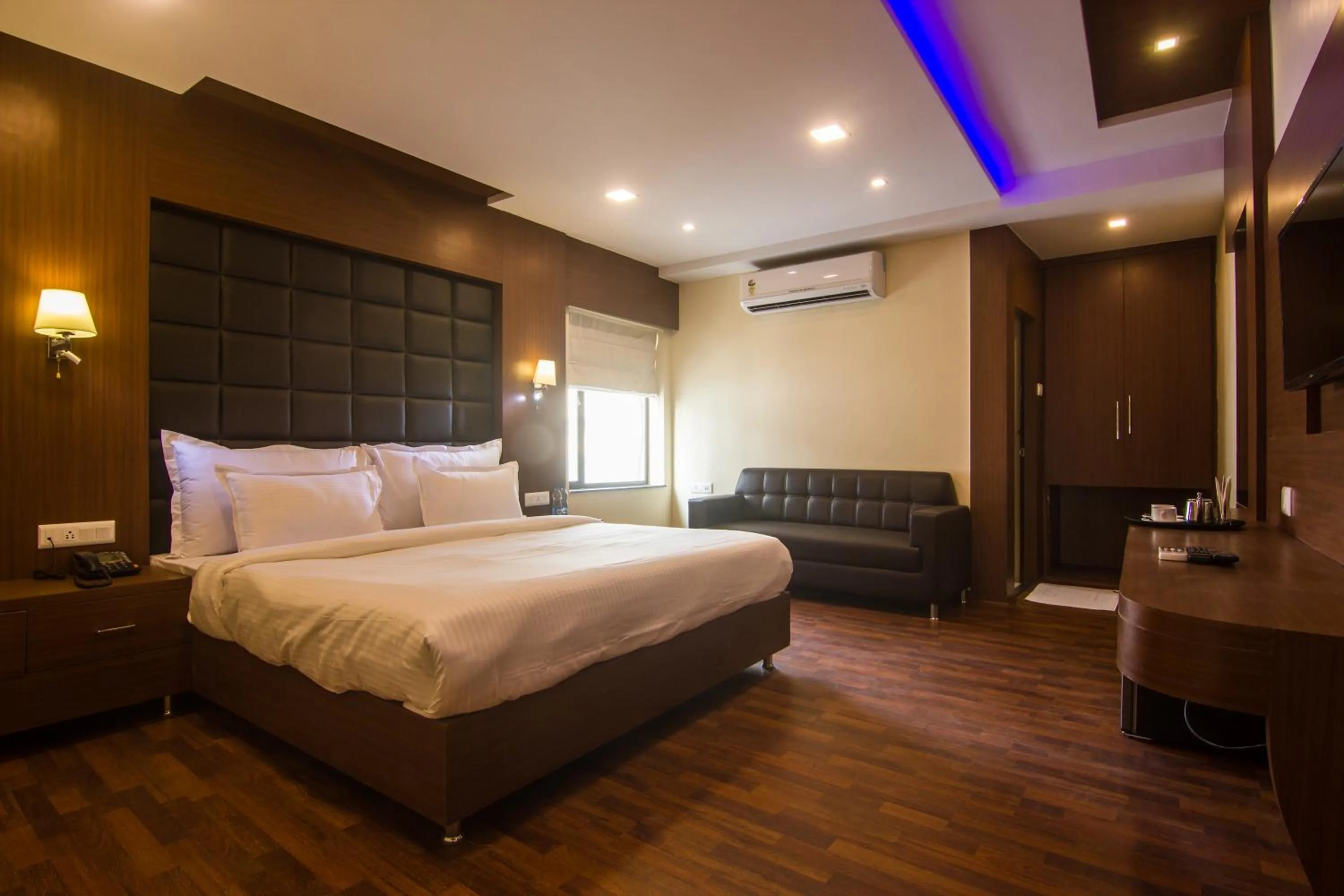 Bed in Hotel Sawood International