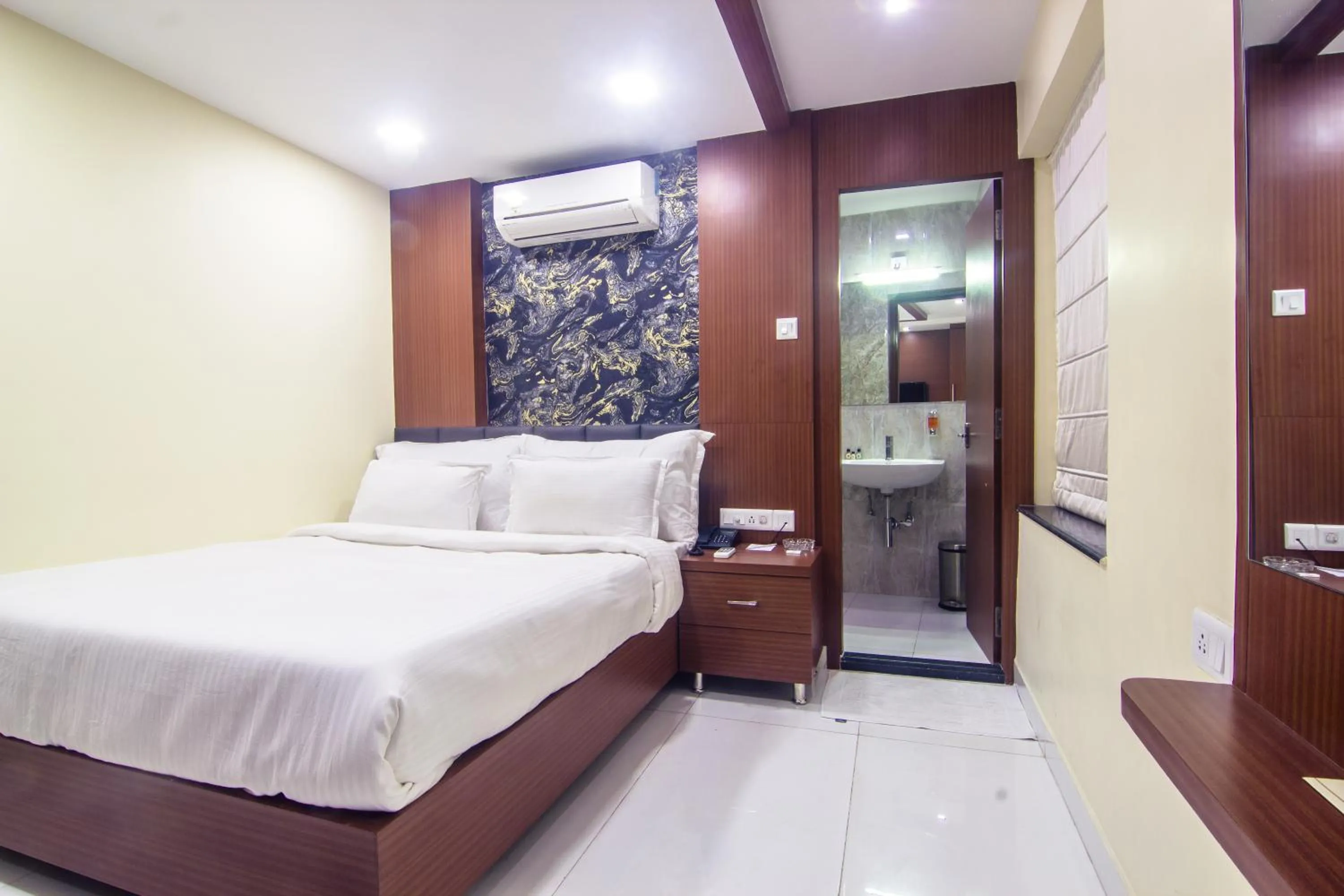 Bed in Hotel Sawood International