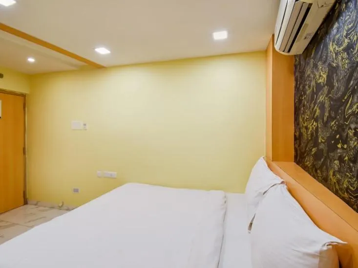 Bed in Hotel Sawood International