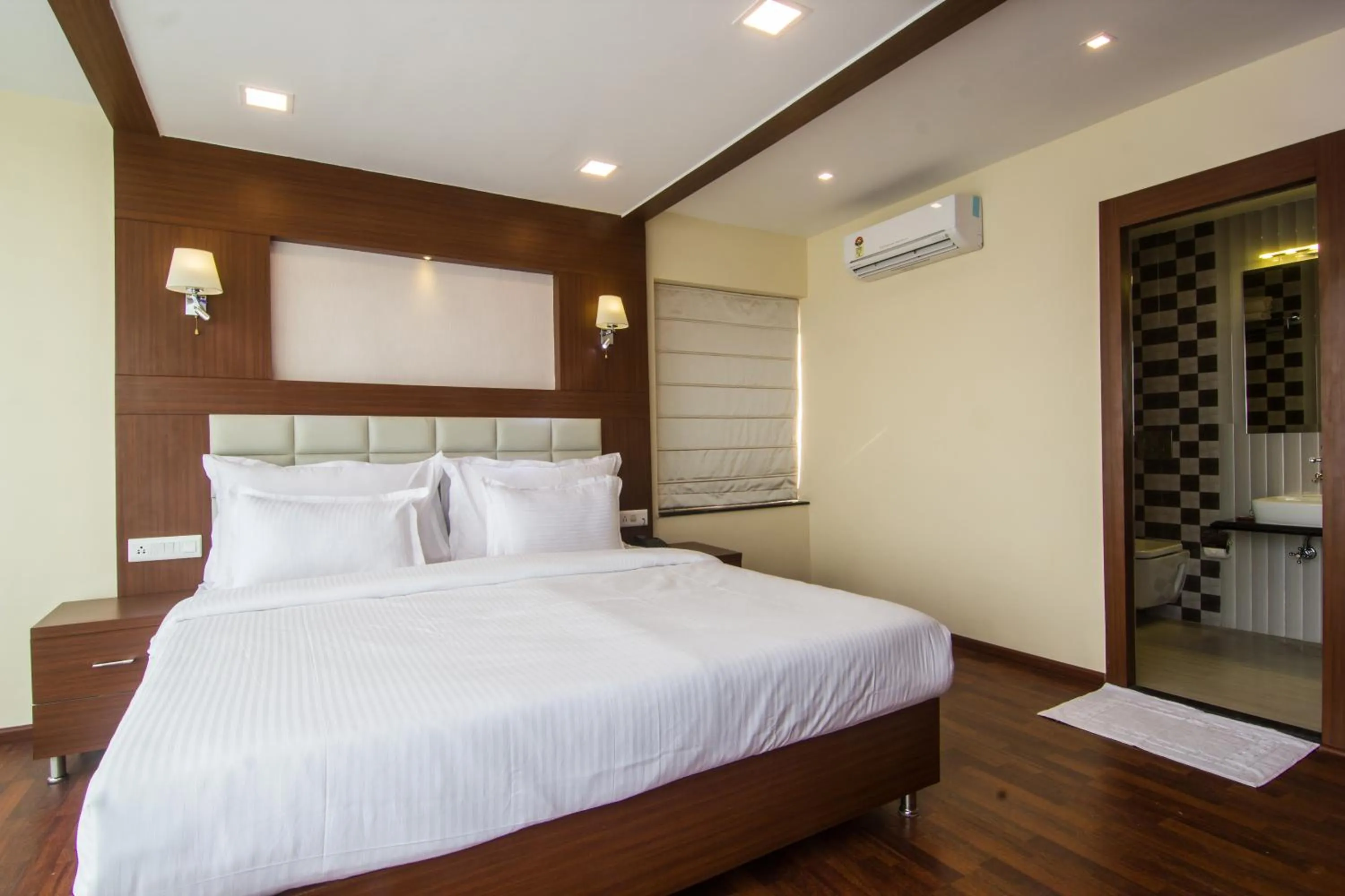 Bed in Hotel Sawood International