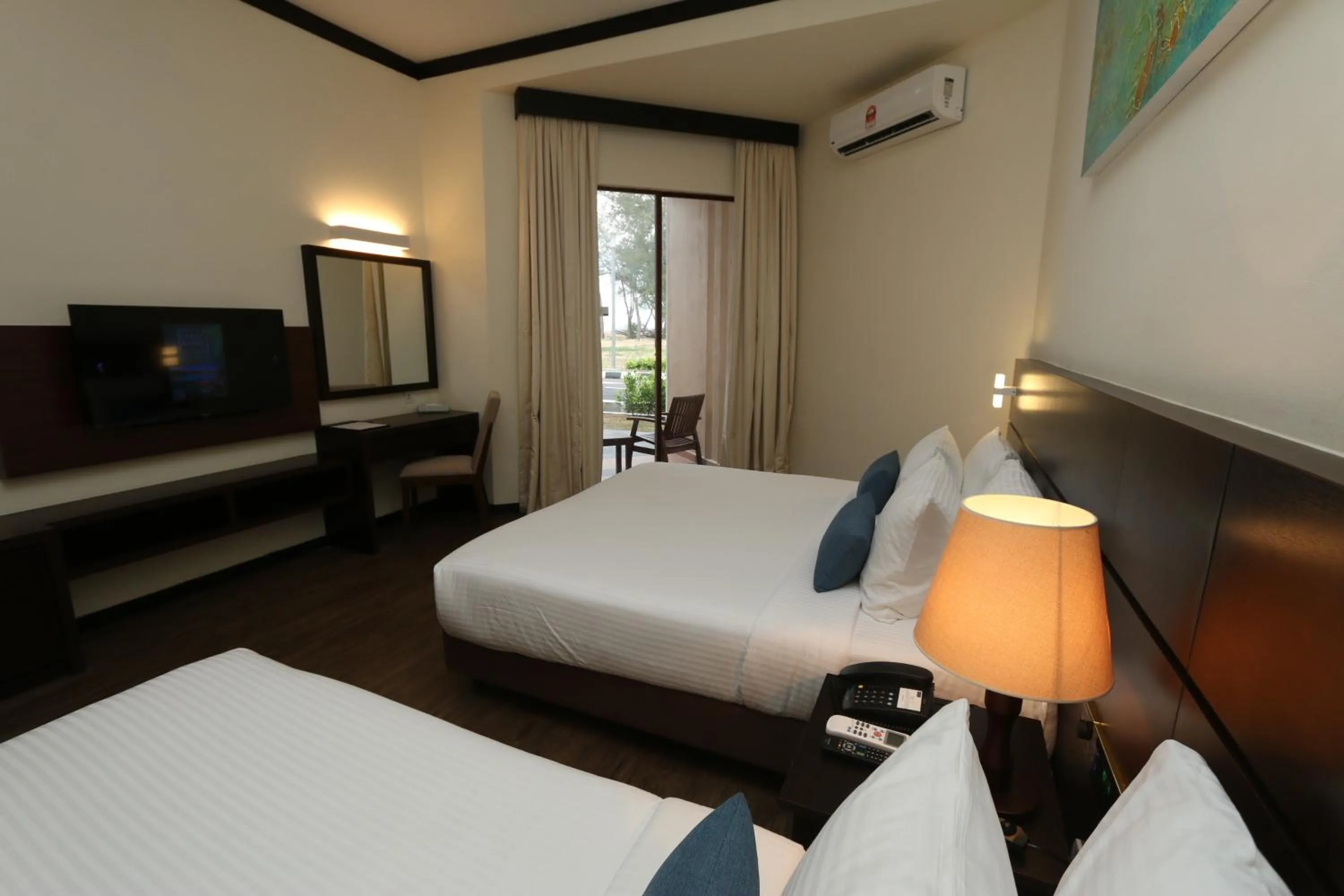 Bed in Villea Rompin Resort & Golf