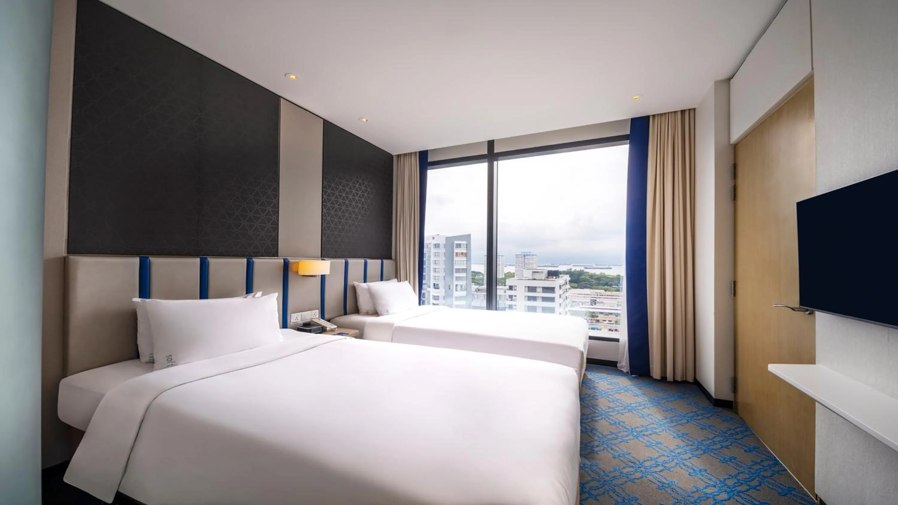 Photo of the whole room, Bed in Holiday Inn Express Singapore Katong by IHG