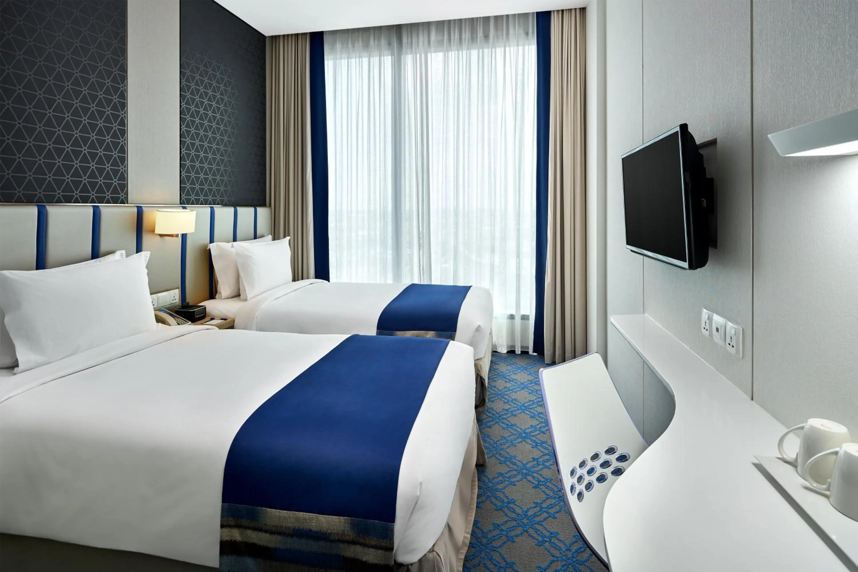 Photo of the whole room, Bed in Holiday Inn Express Singapore Katong by IHG