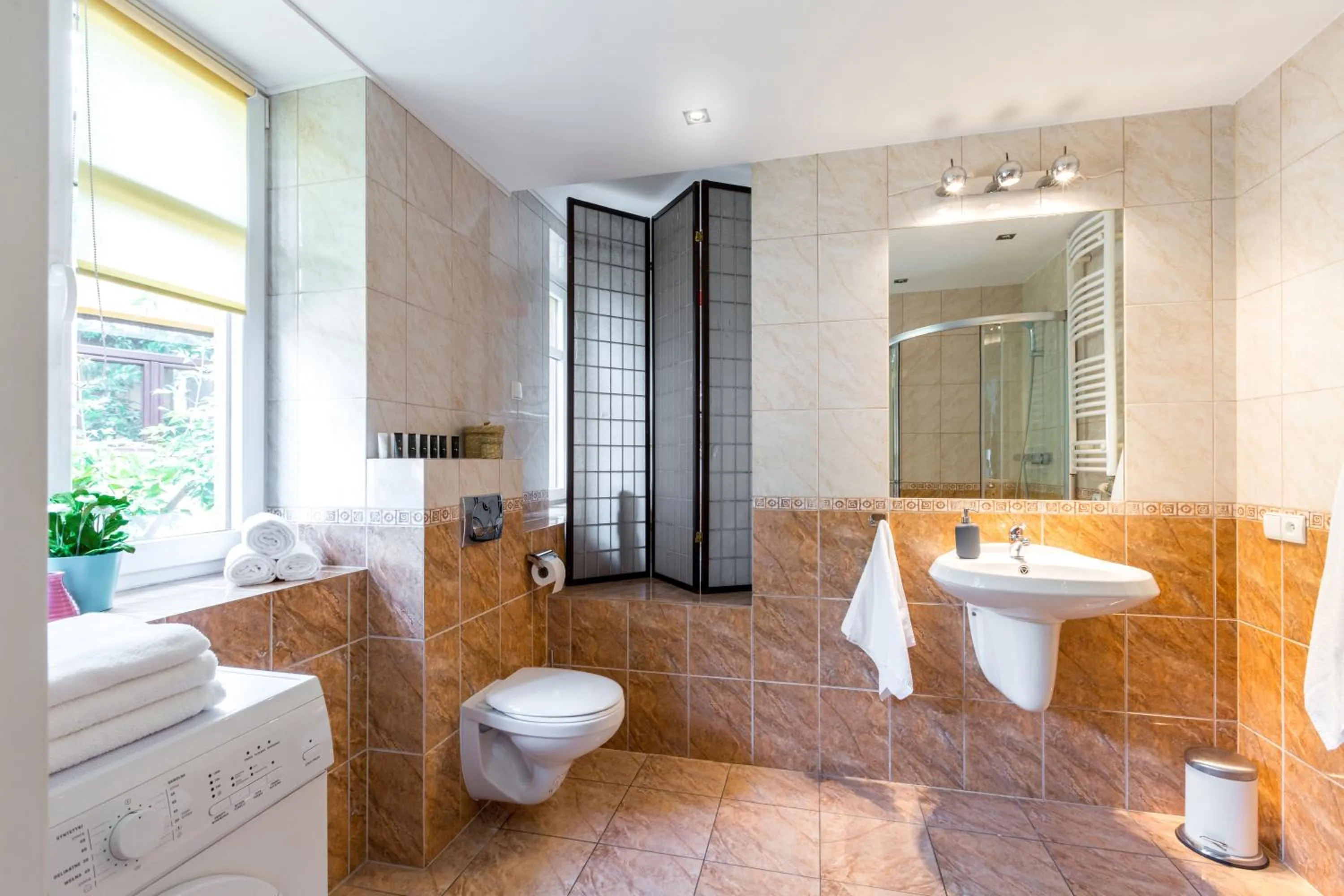 Bathroom in Wawel Cracow Old City Apartments - Friendhouse Apartments