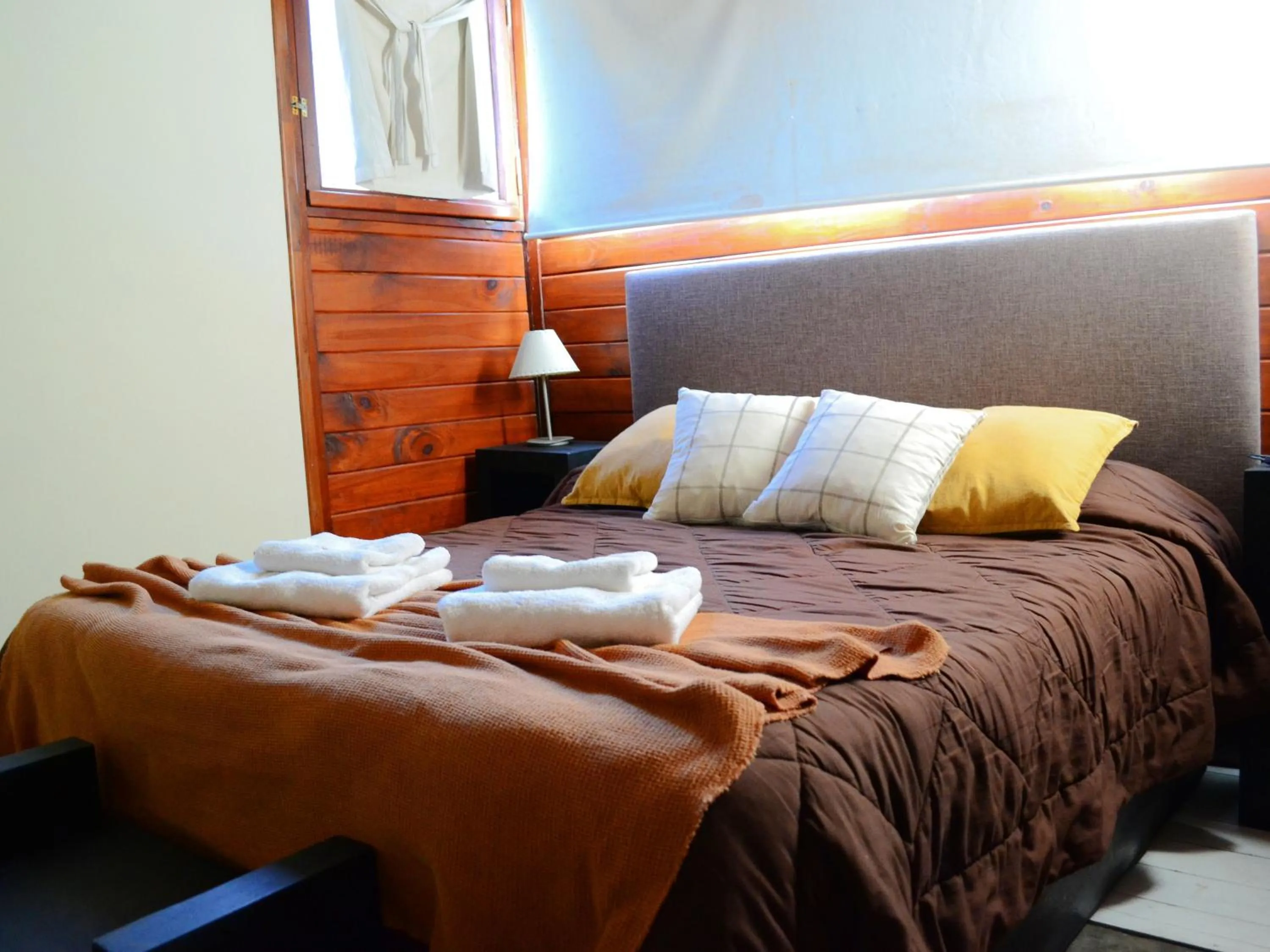 Bed in Altos Medanos Cabañas & Club de Bosque