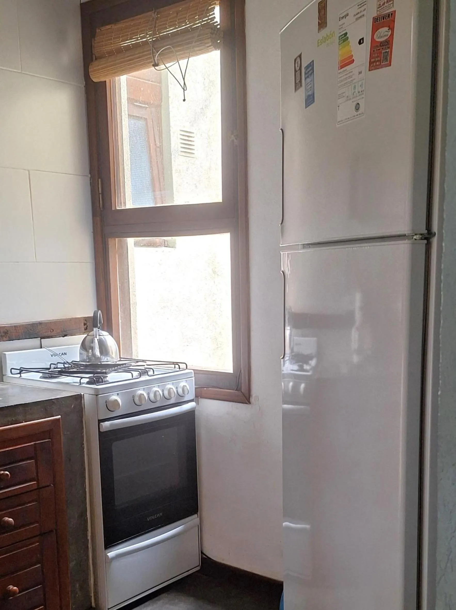 Kitchen or kitchenette in Altos Medanos Cabañas & Club de Bosque