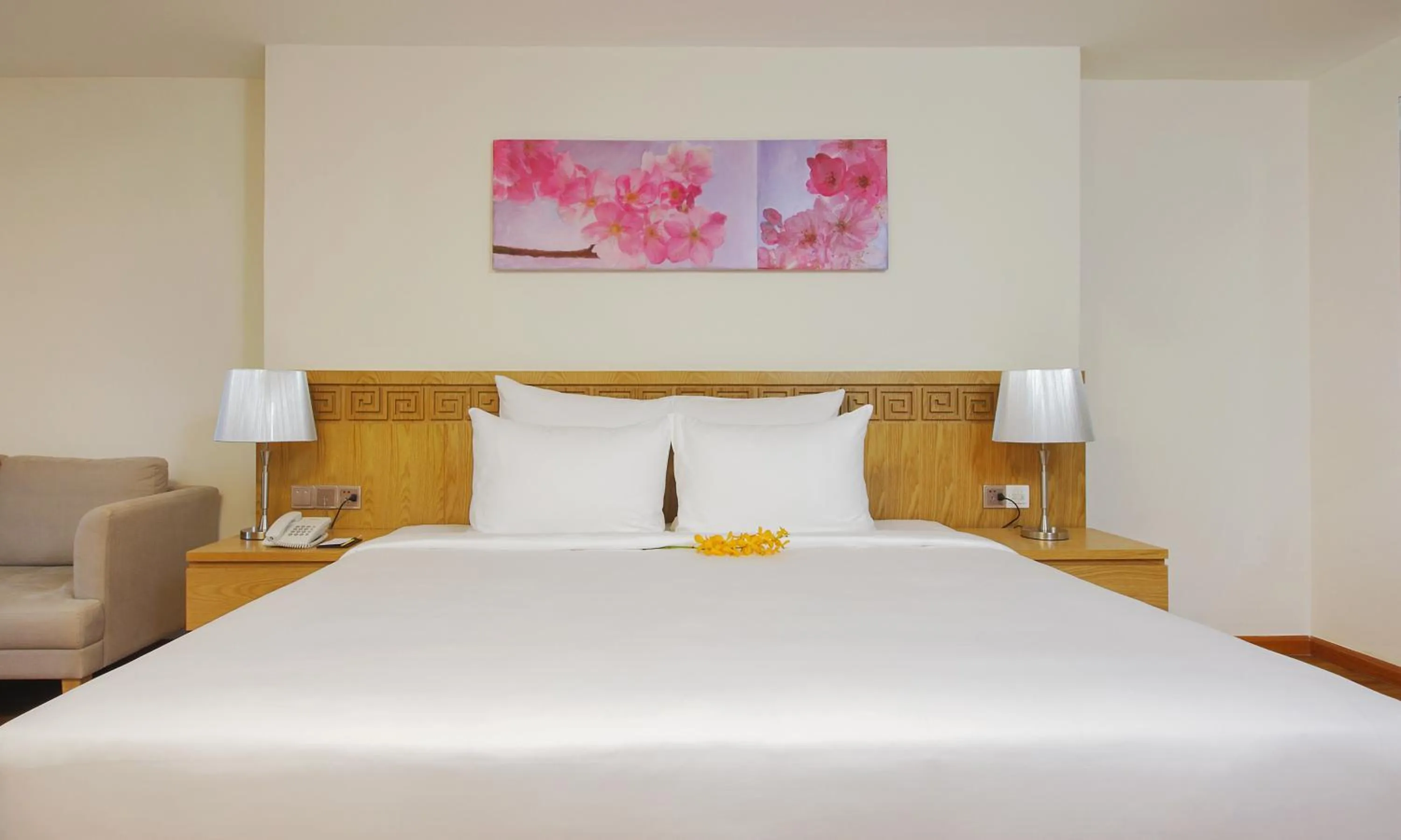 Bed in Rosaka Nha Trang Hotel