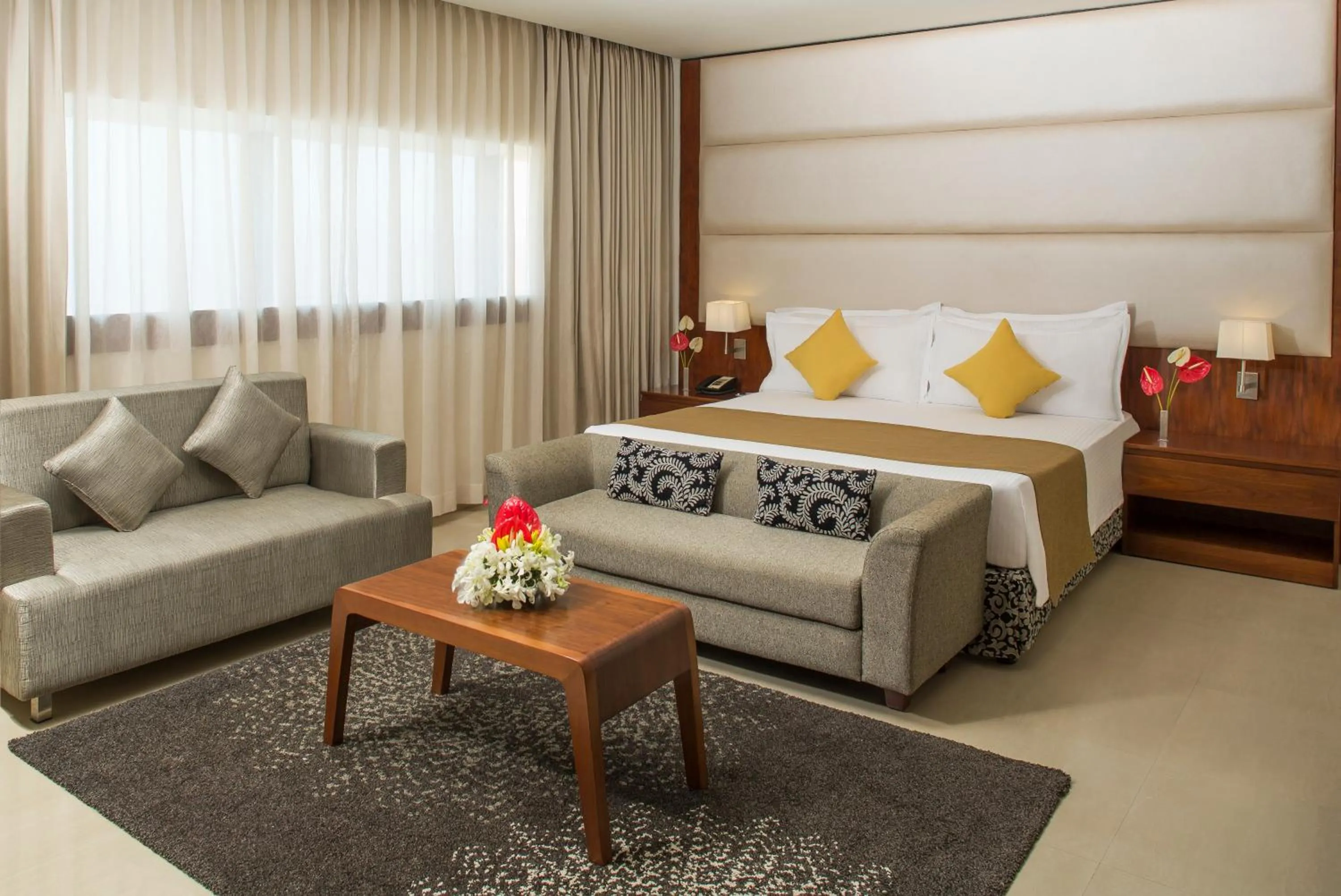 Photo of the whole room, Bed in The Raviz Calicut