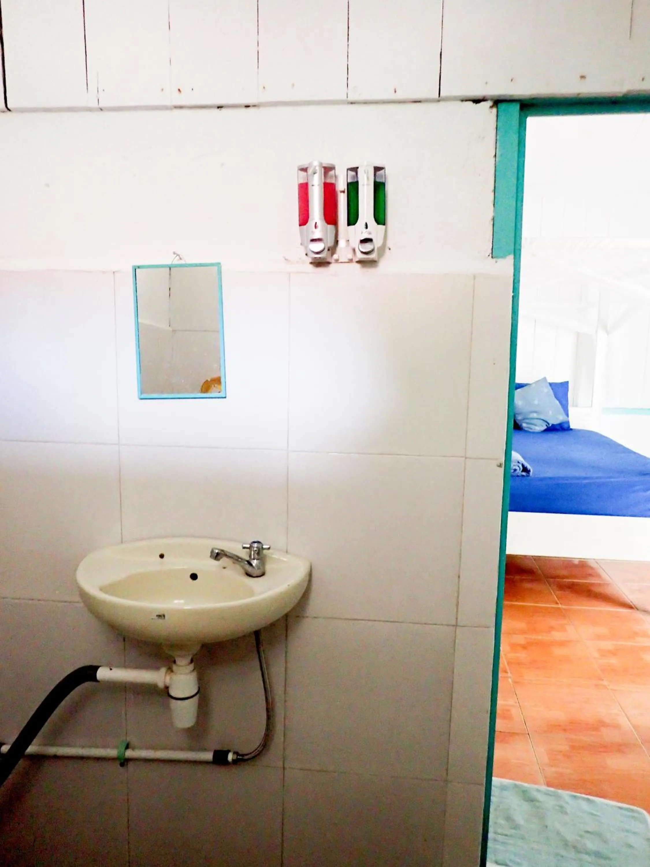 Toilet, Bed in Scuba Republic Beach Bungalows