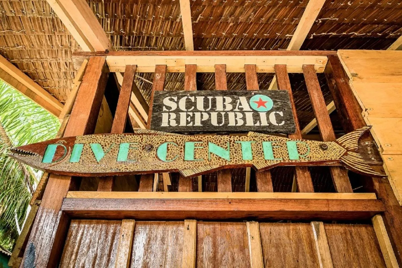 Property logo or sign in Scuba Republic Beach Bungalows