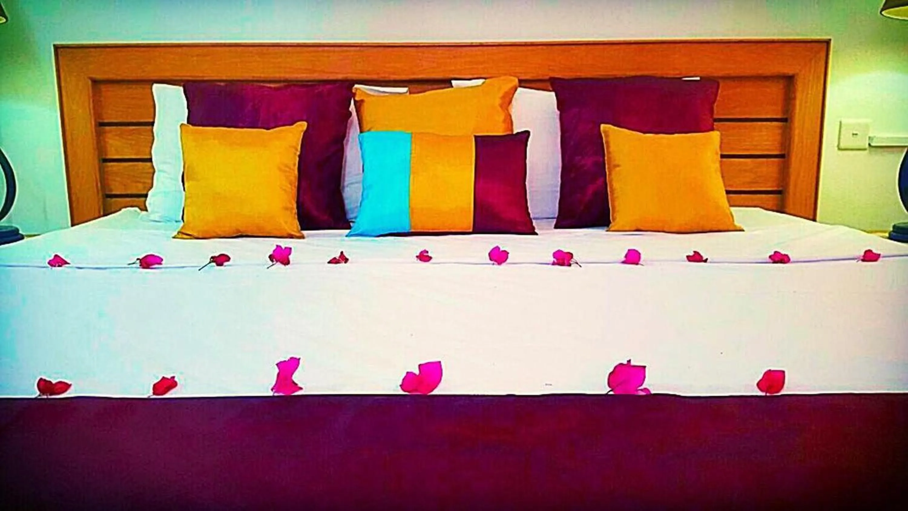 Bed in Ocean Villas Apart Hotel