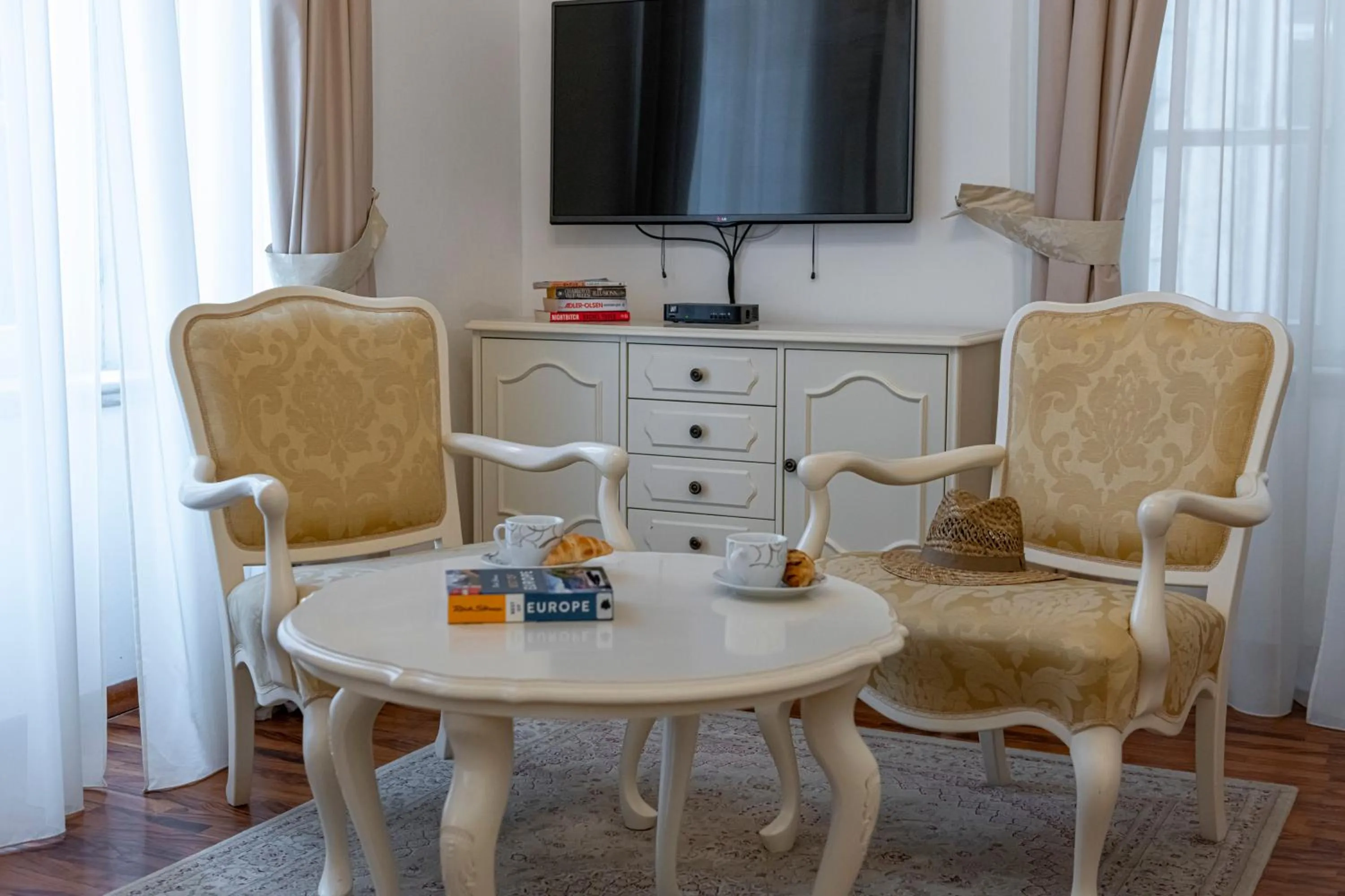 Living room in Apartments More