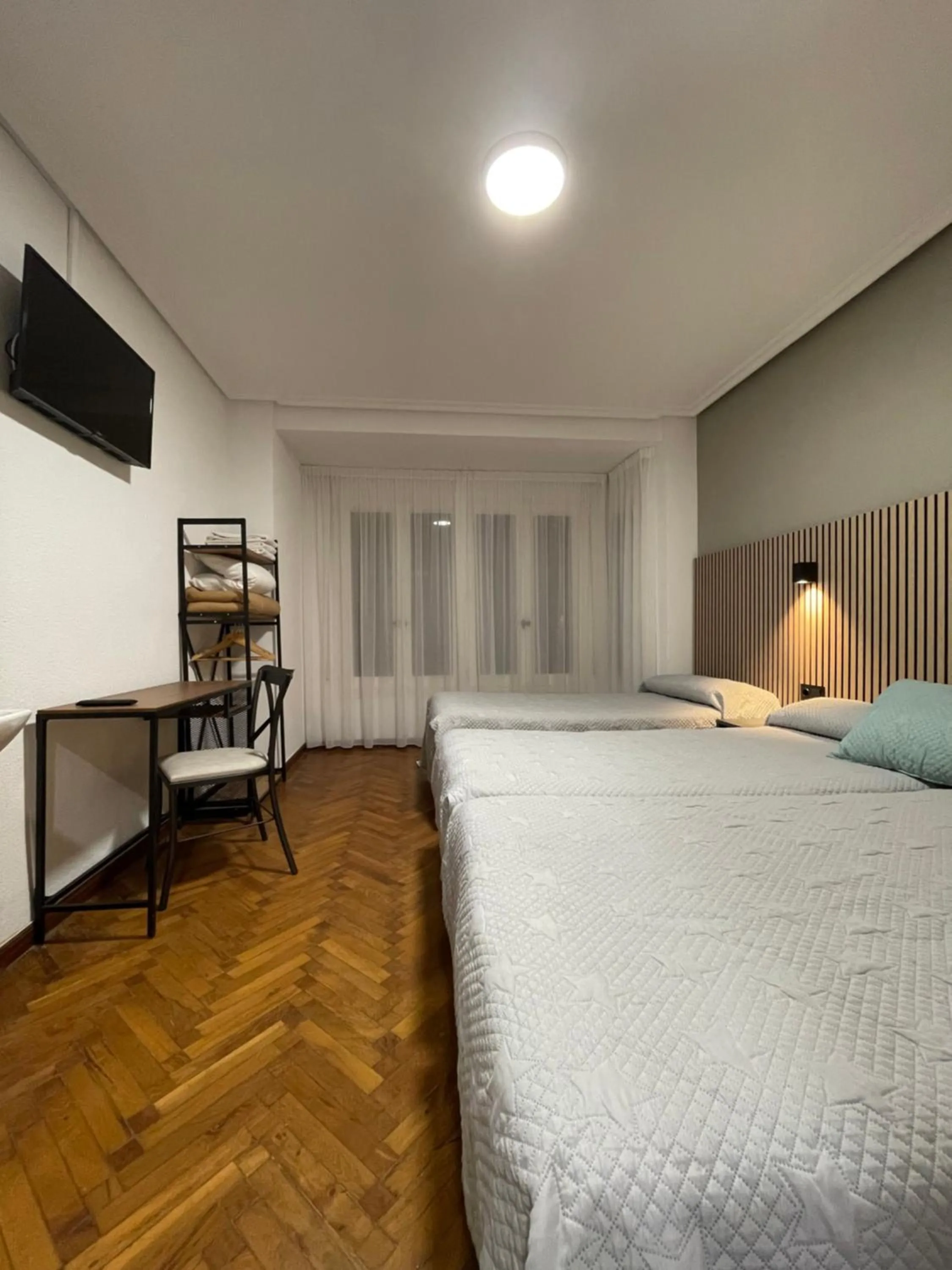 Basic Triple Room with Shared Bathroom - single occupancy in Pensión La Encina