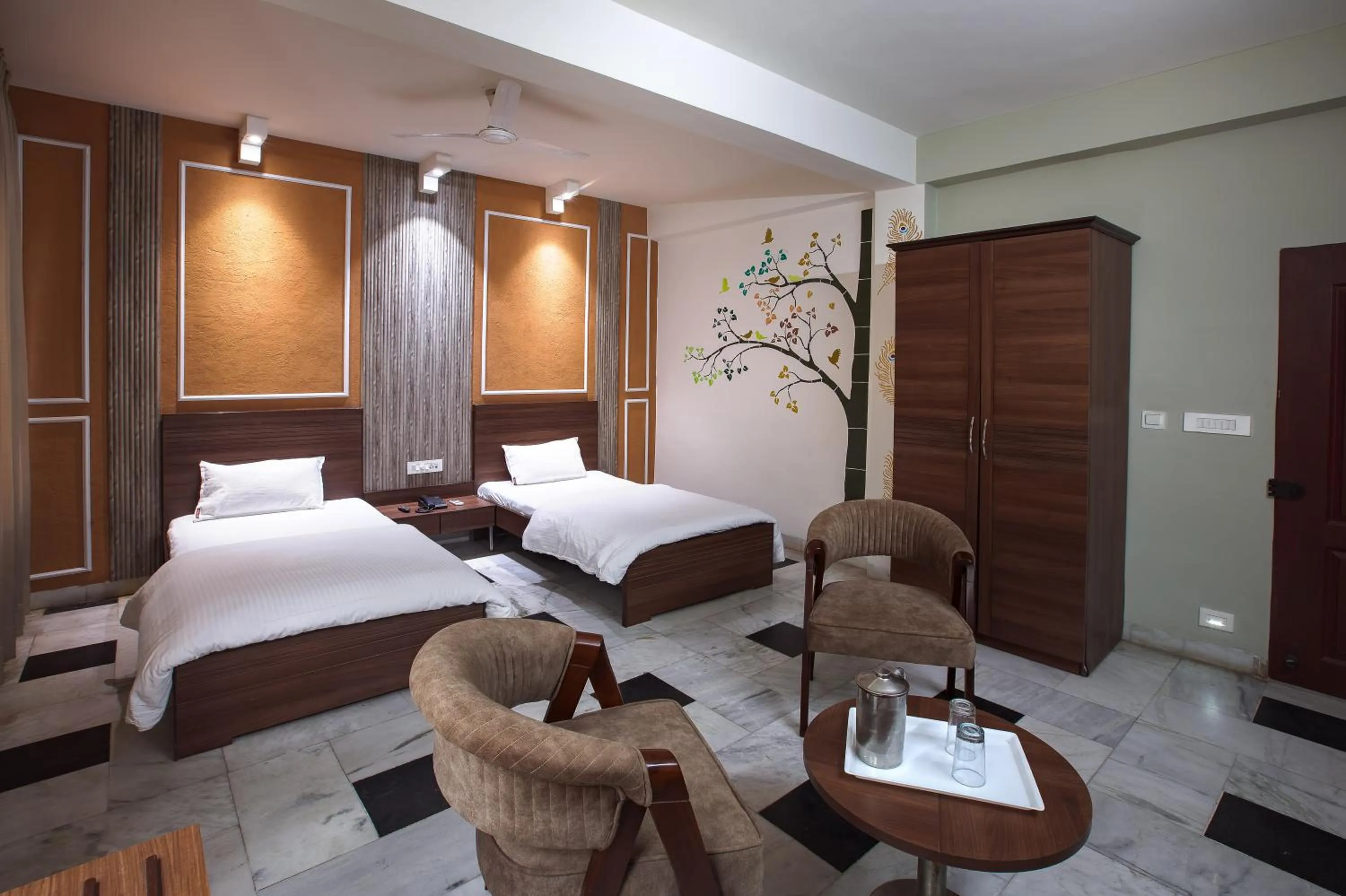 Bed in Hotel Bhakti Dhama