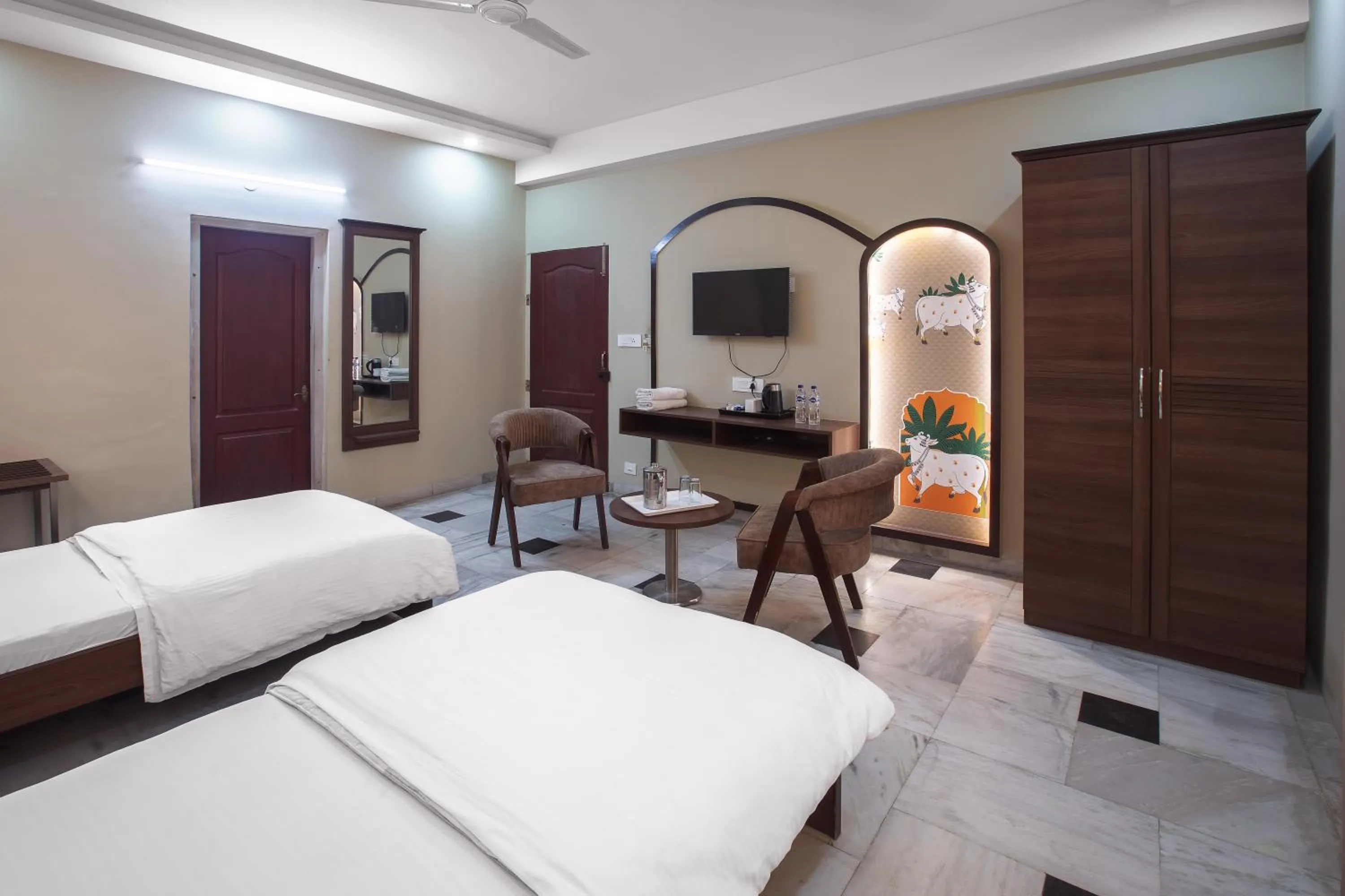 Bed in Hotel Bhakti Dhama