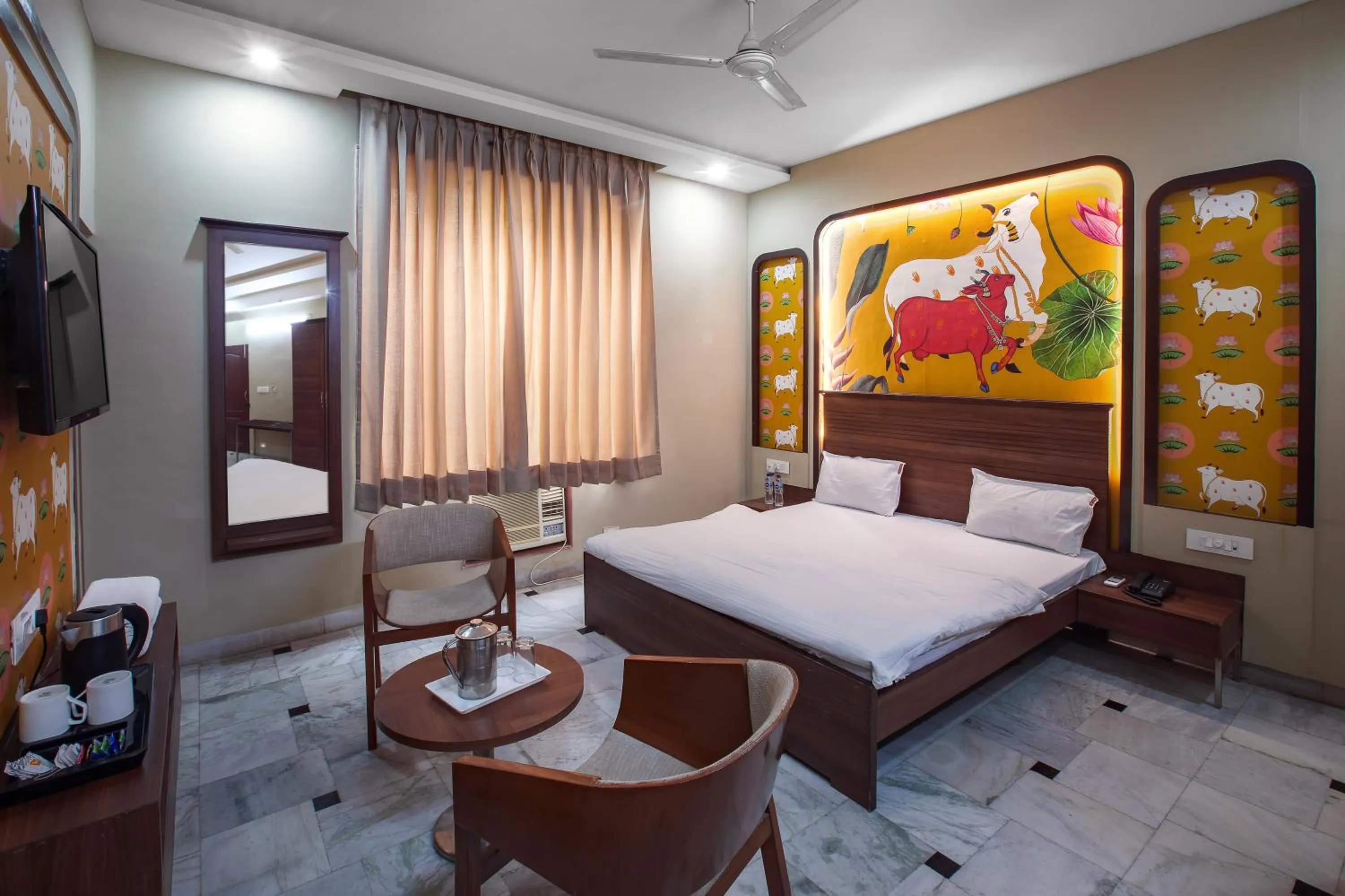 Bed in Hotel Bhakti Dhama