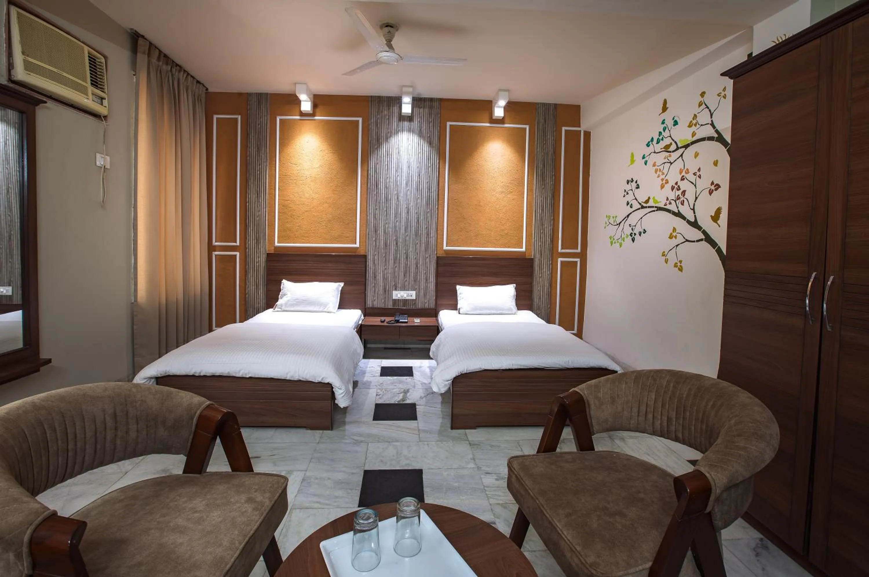 Bed in Hotel Bhakti Dhama