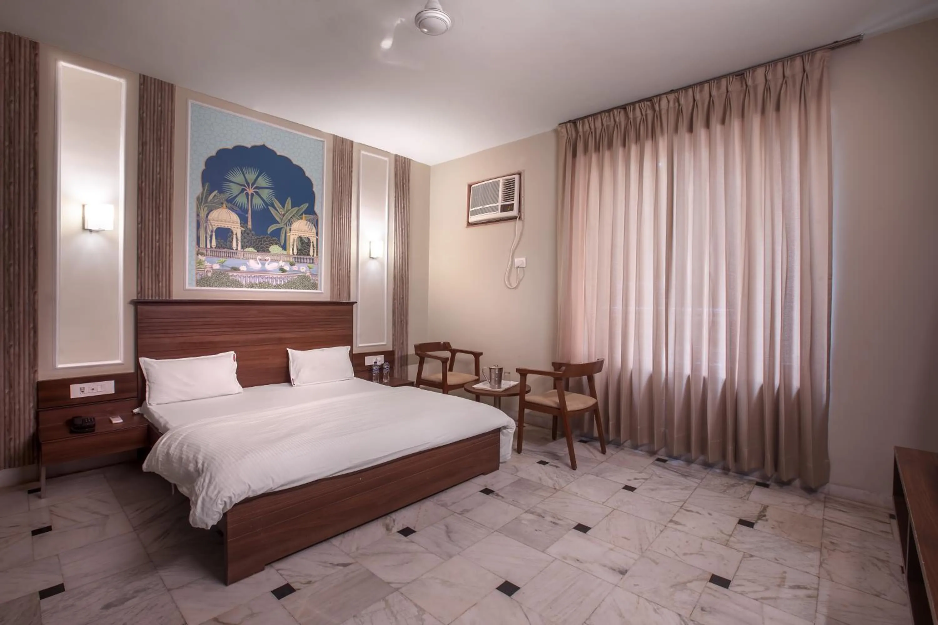 Bed in Hotel Bhakti Dhama