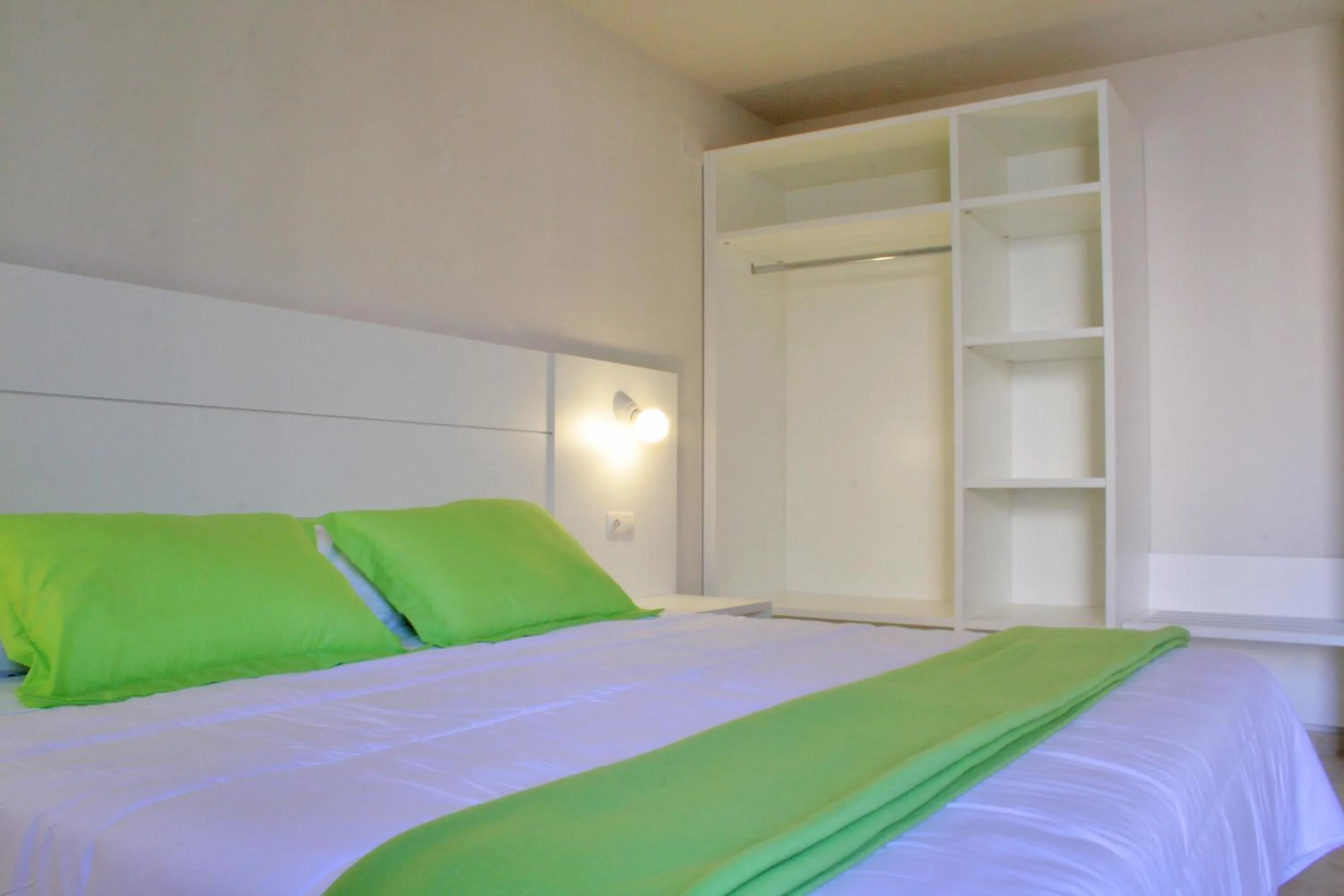 Bed in L' Escala Resort