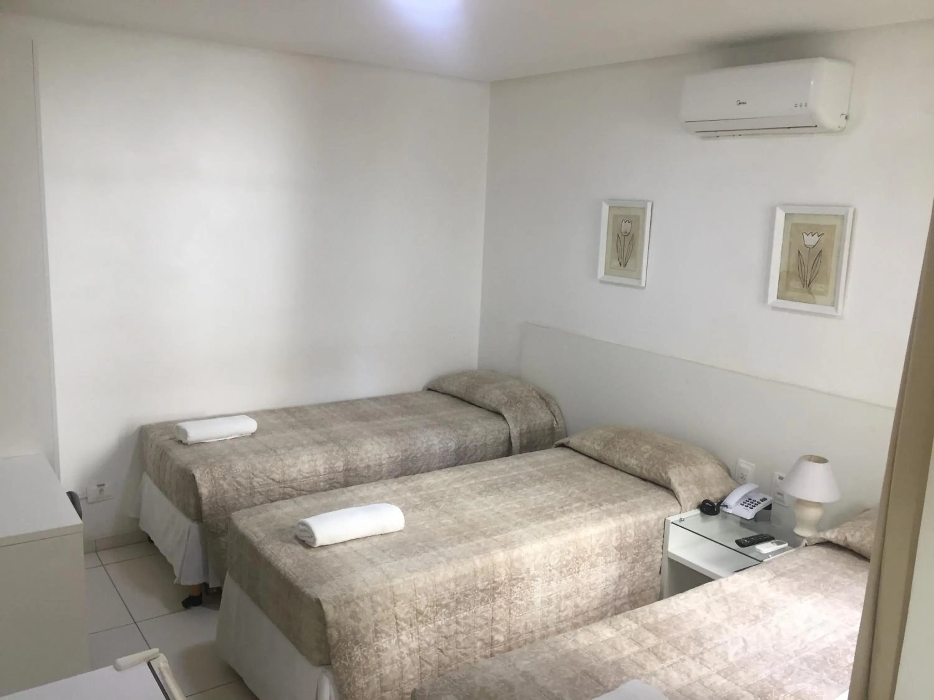 Bed in Pousada Lorde Inglês