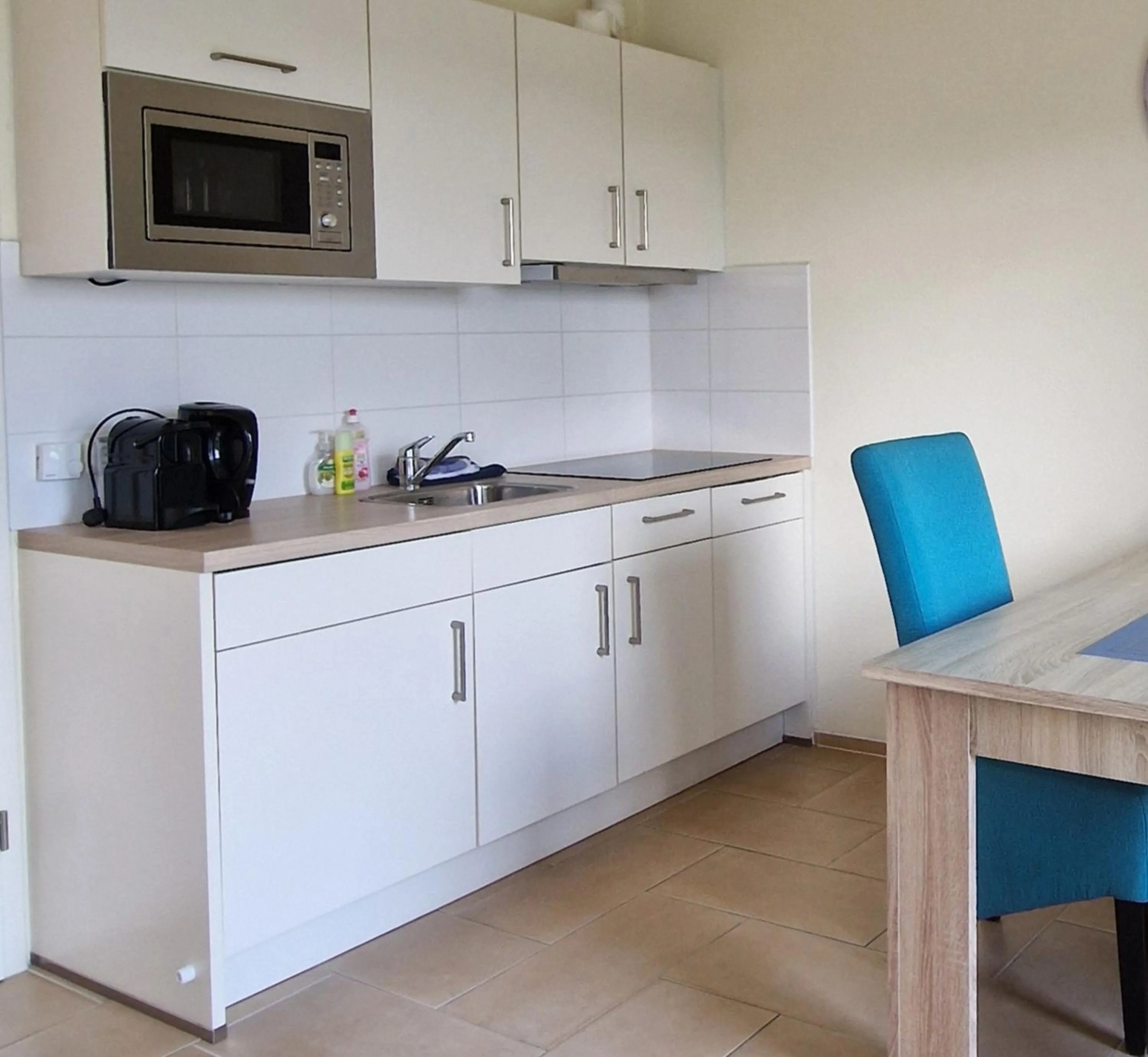 Kitchen or kitchenette in Hotel Garni Am Lindenhof Bunde