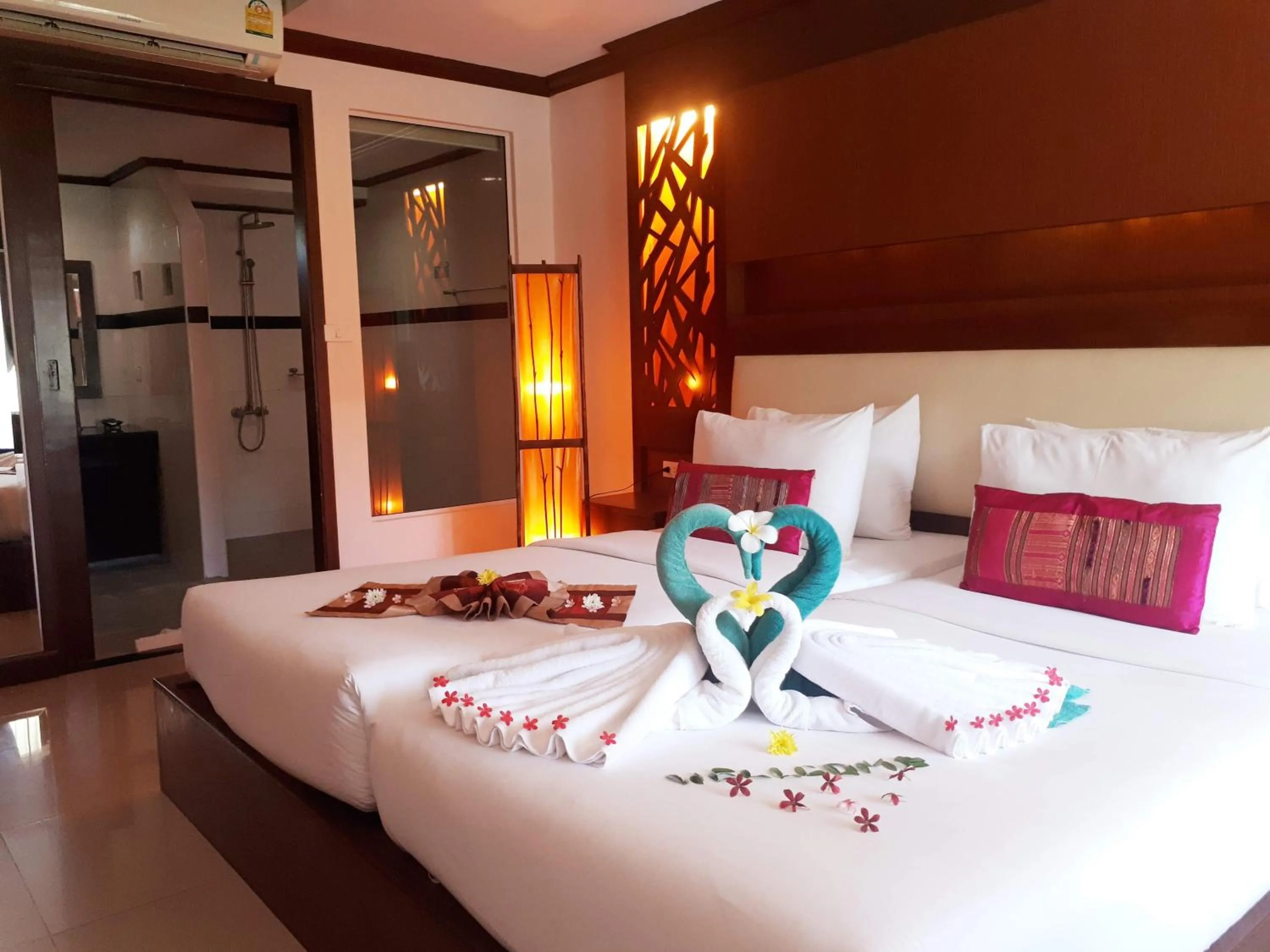 Bed in Chivatara Resort Bang Tao Beach Phuket - SHA