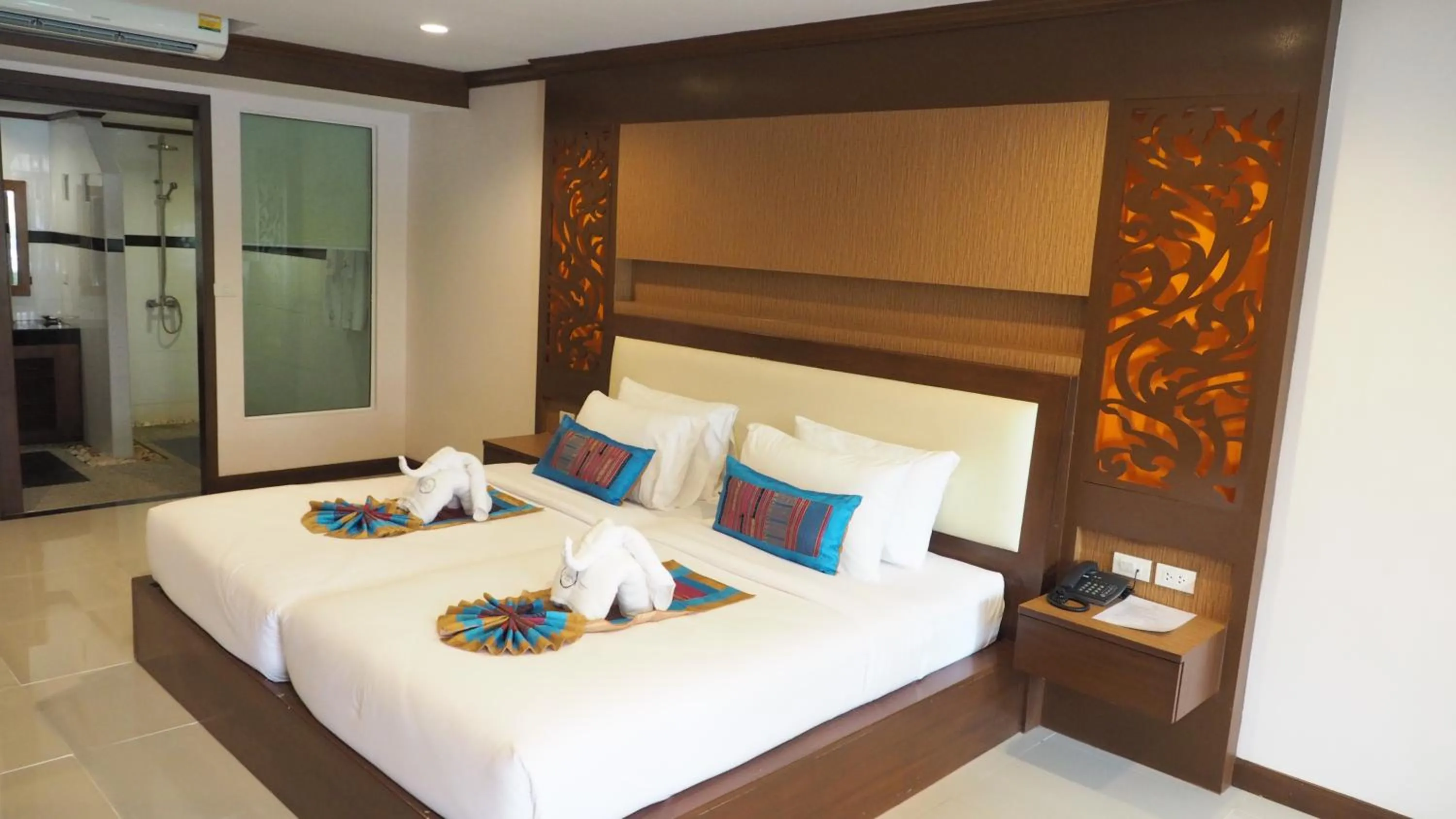 Bed in Chivatara Resort Bang Tao Beach Phuket - SHA