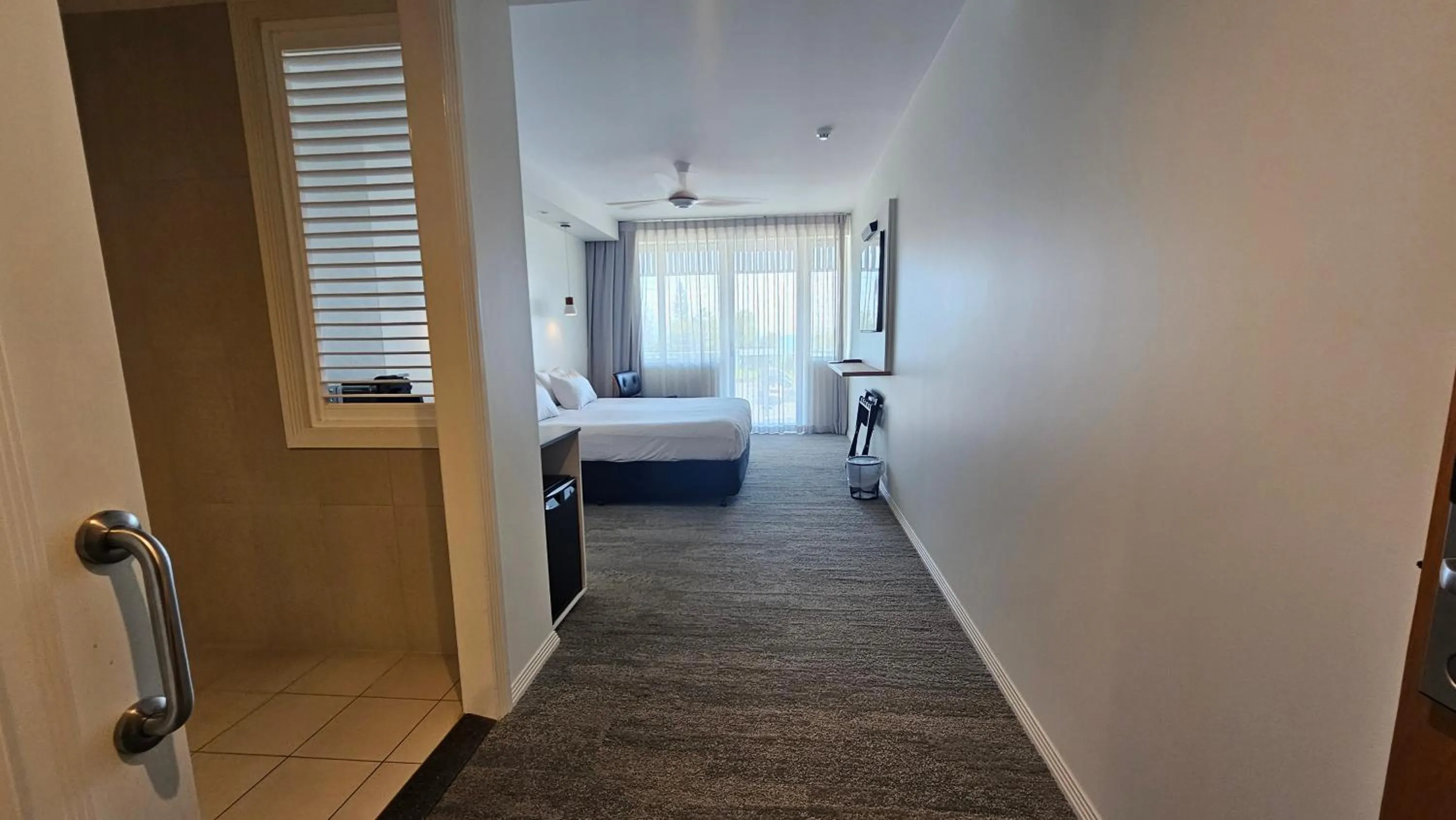 Bed in Heart Hotel and Gallery Whitsundays