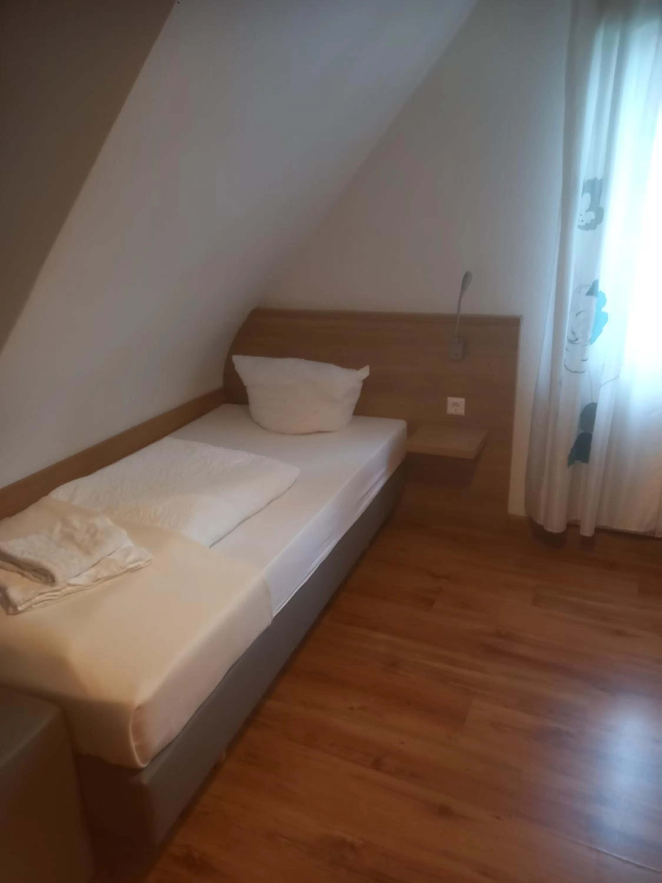 Bed in Hotel Krone Bad Cannstatt