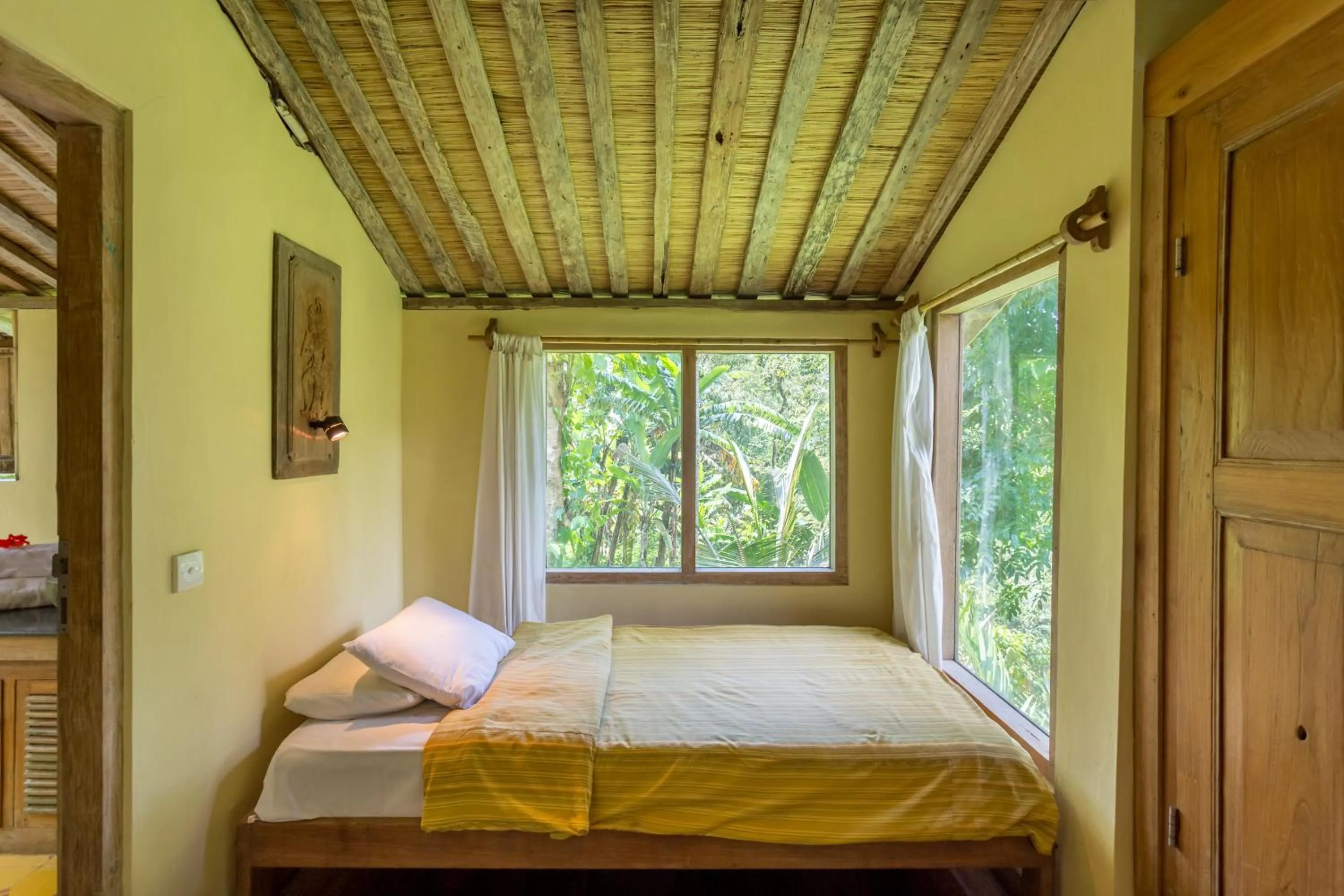 Bed in Prana Dewi Mountain Resort