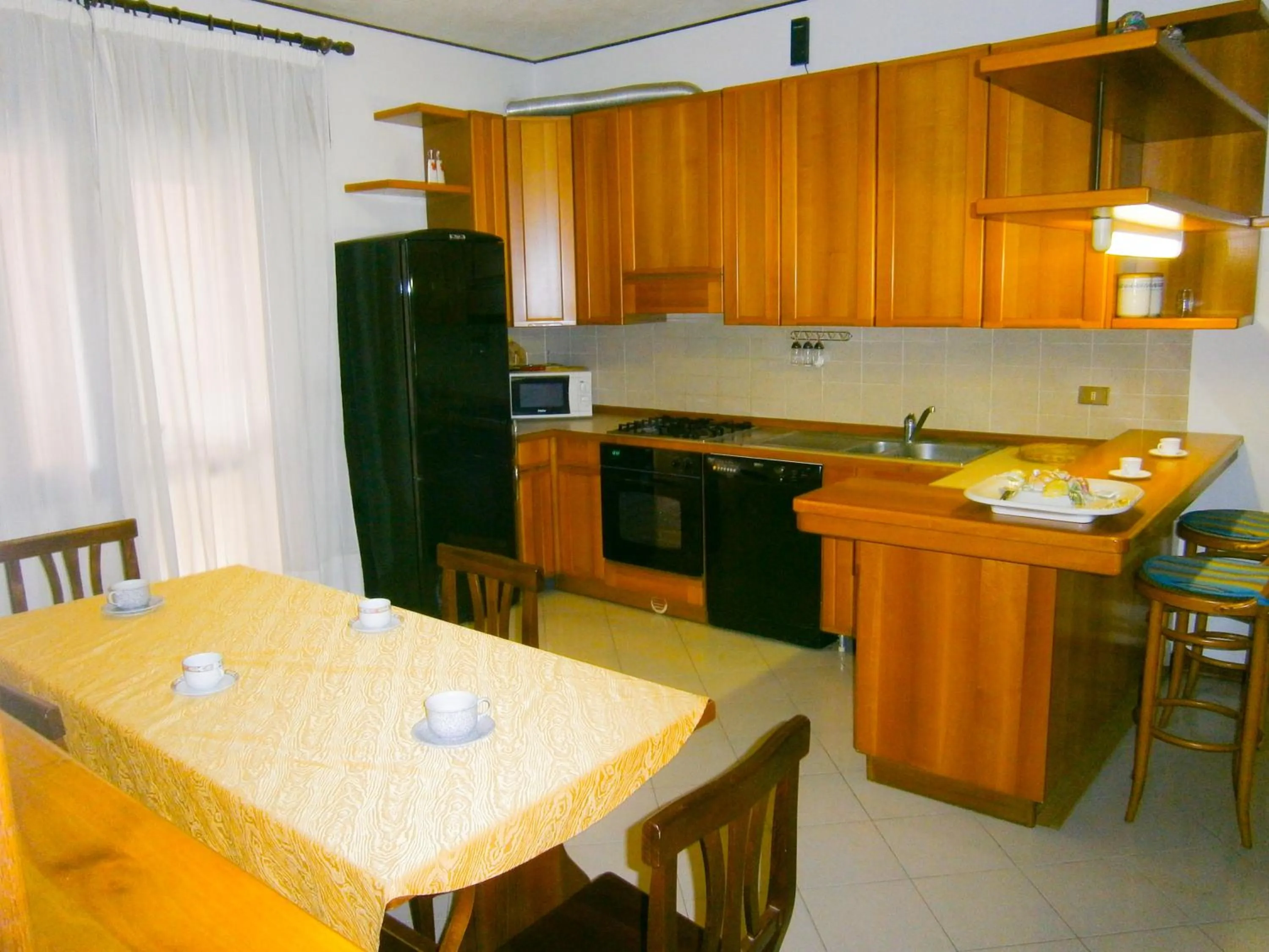 Kitchen or kitchenette in Appartamento Dalla Bella - Agenzia Cocal