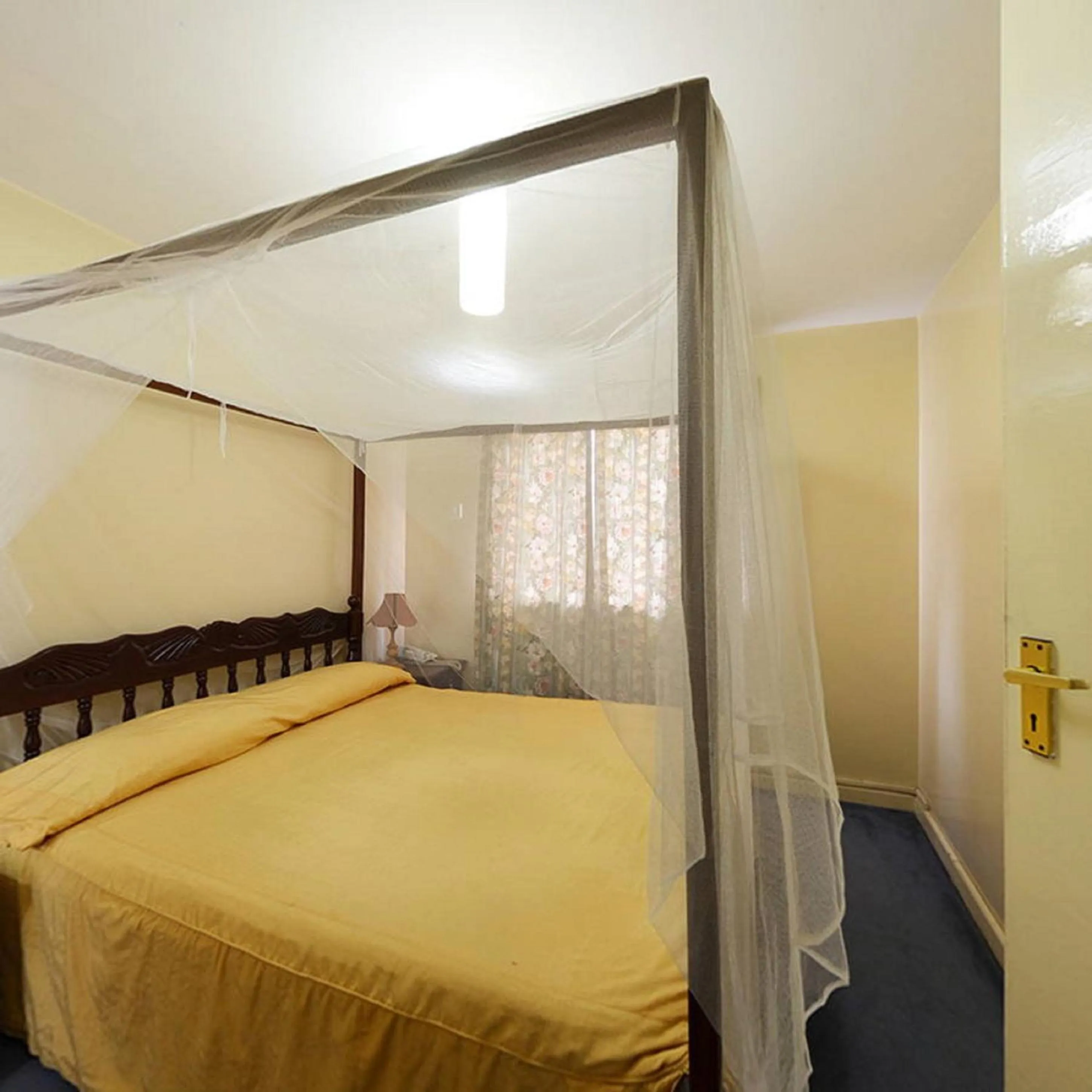 Bed in Adventist LMS Guest House & Conference Centre