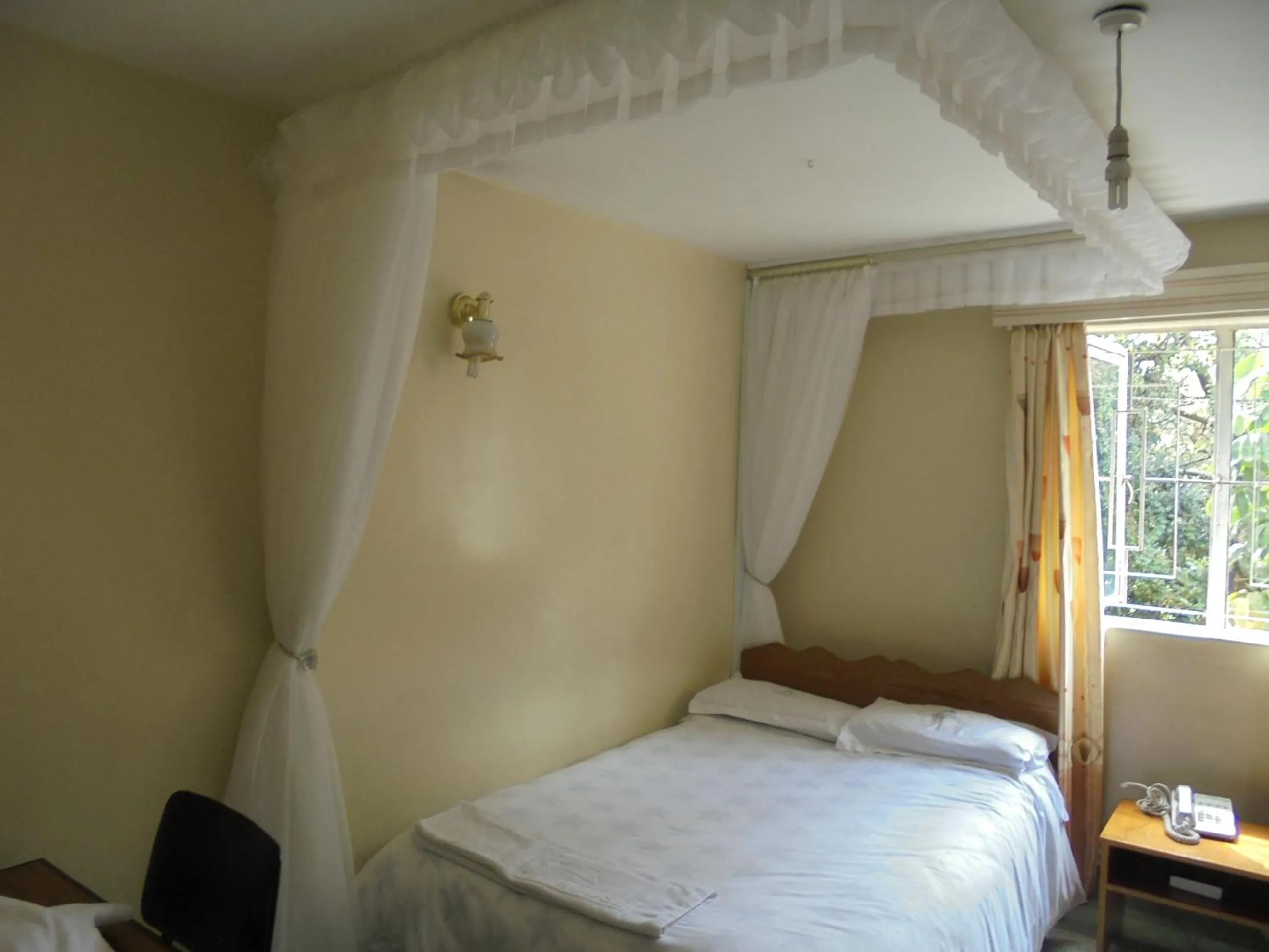 Bed in Adventist LMS Guest House & Conference Centre