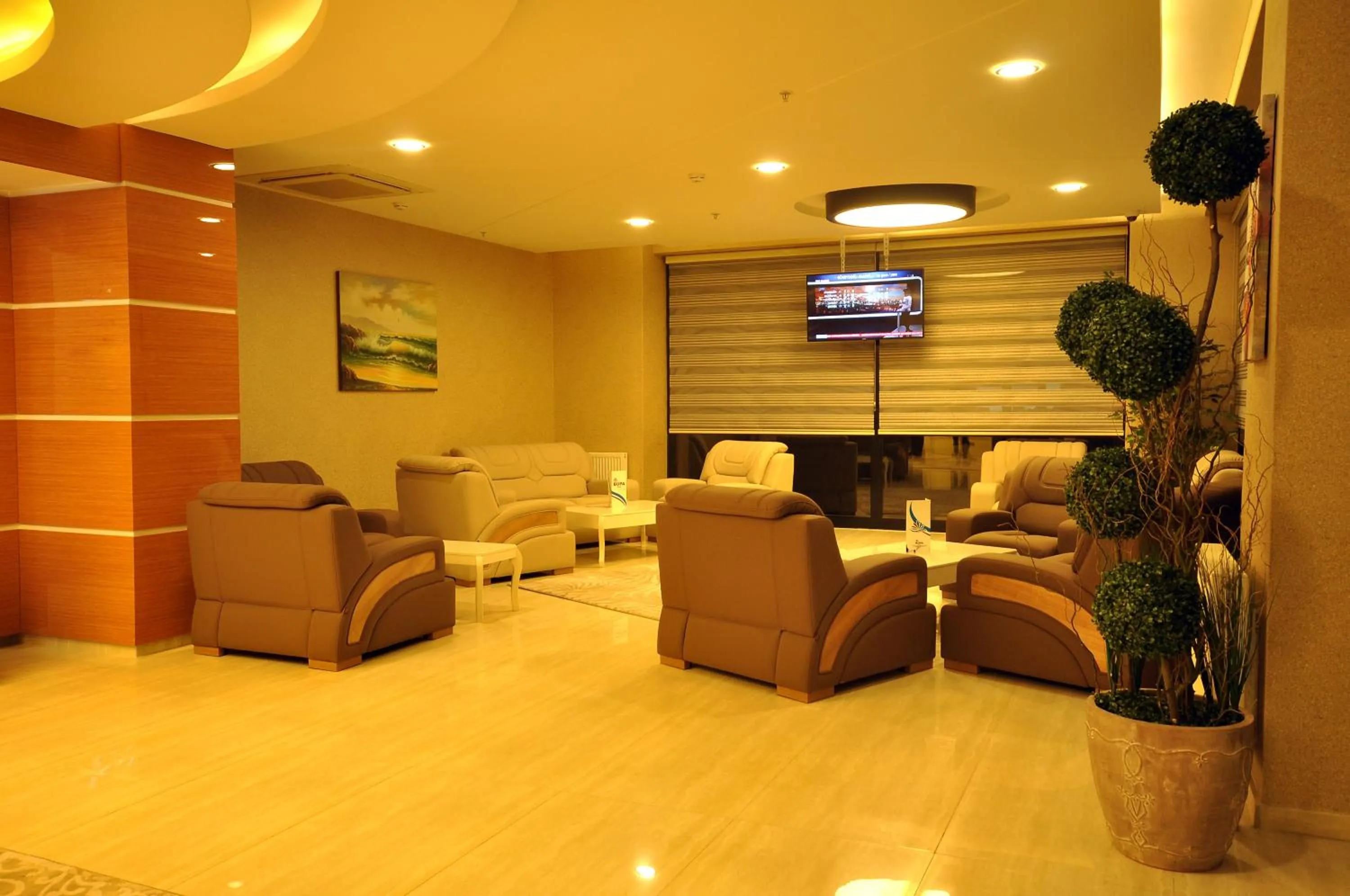 Lobby or reception in Bupa Hotel