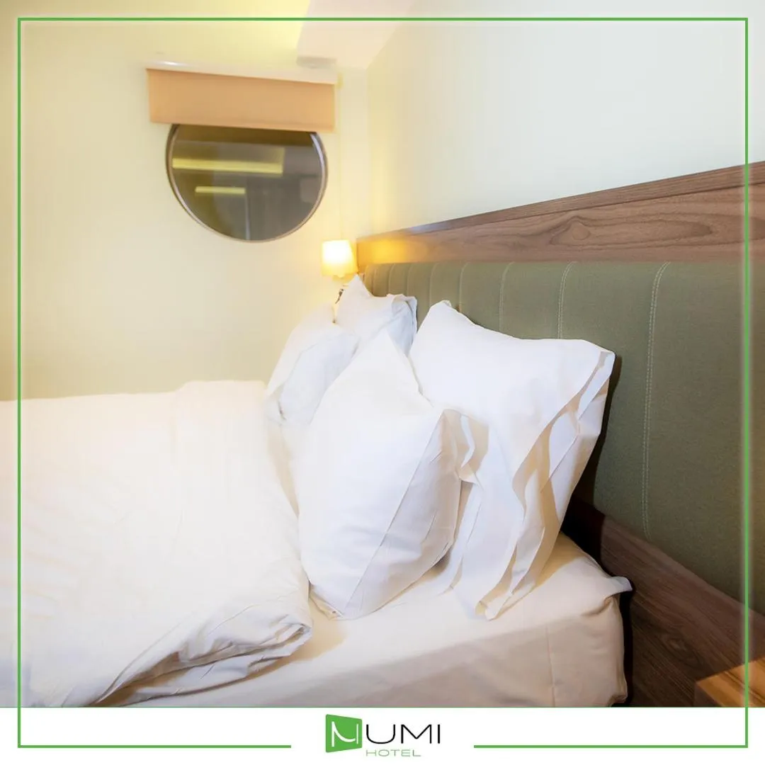 Bed in Numi Hotel