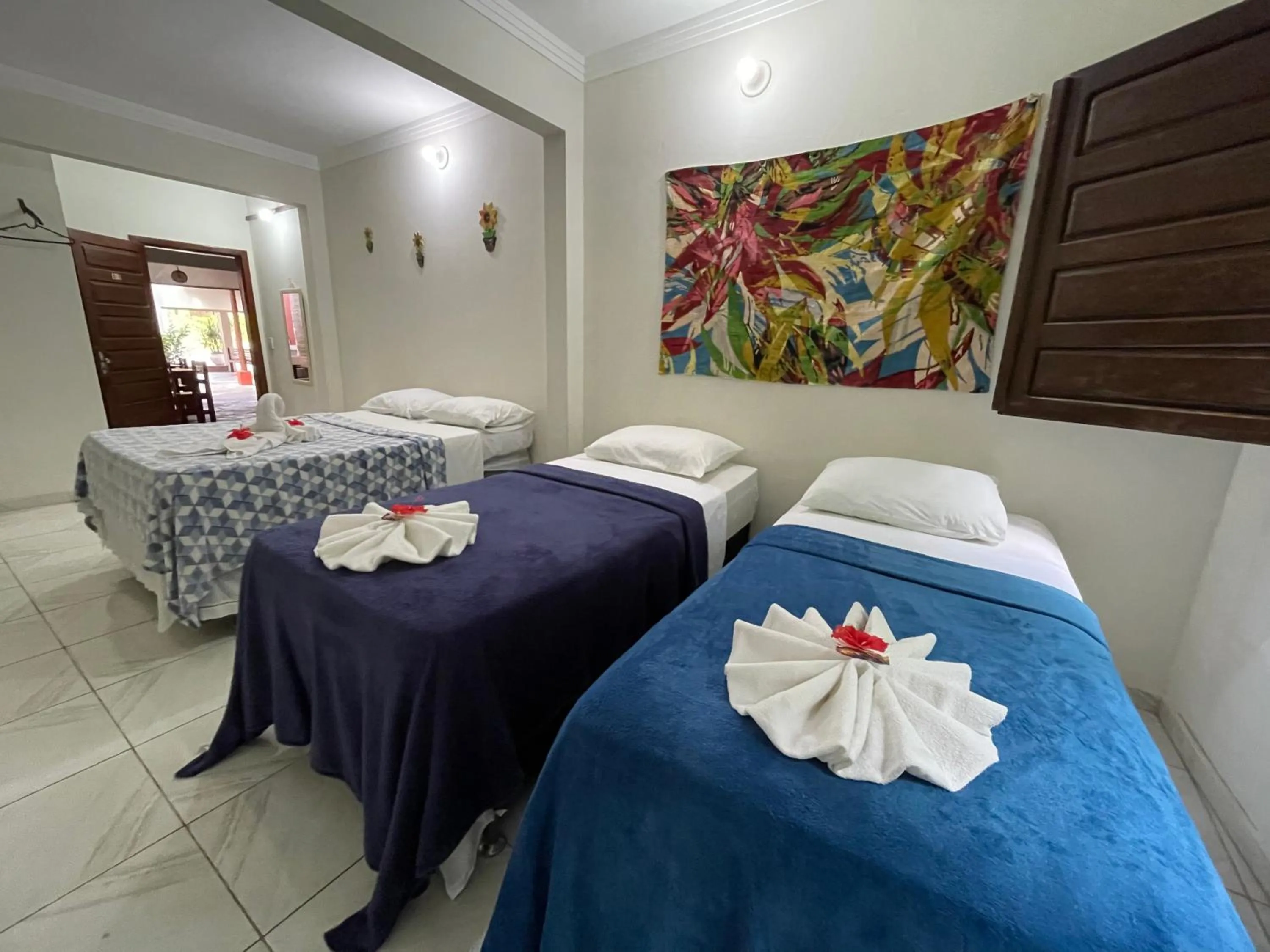 Bed in Pousada Vôo da Águia