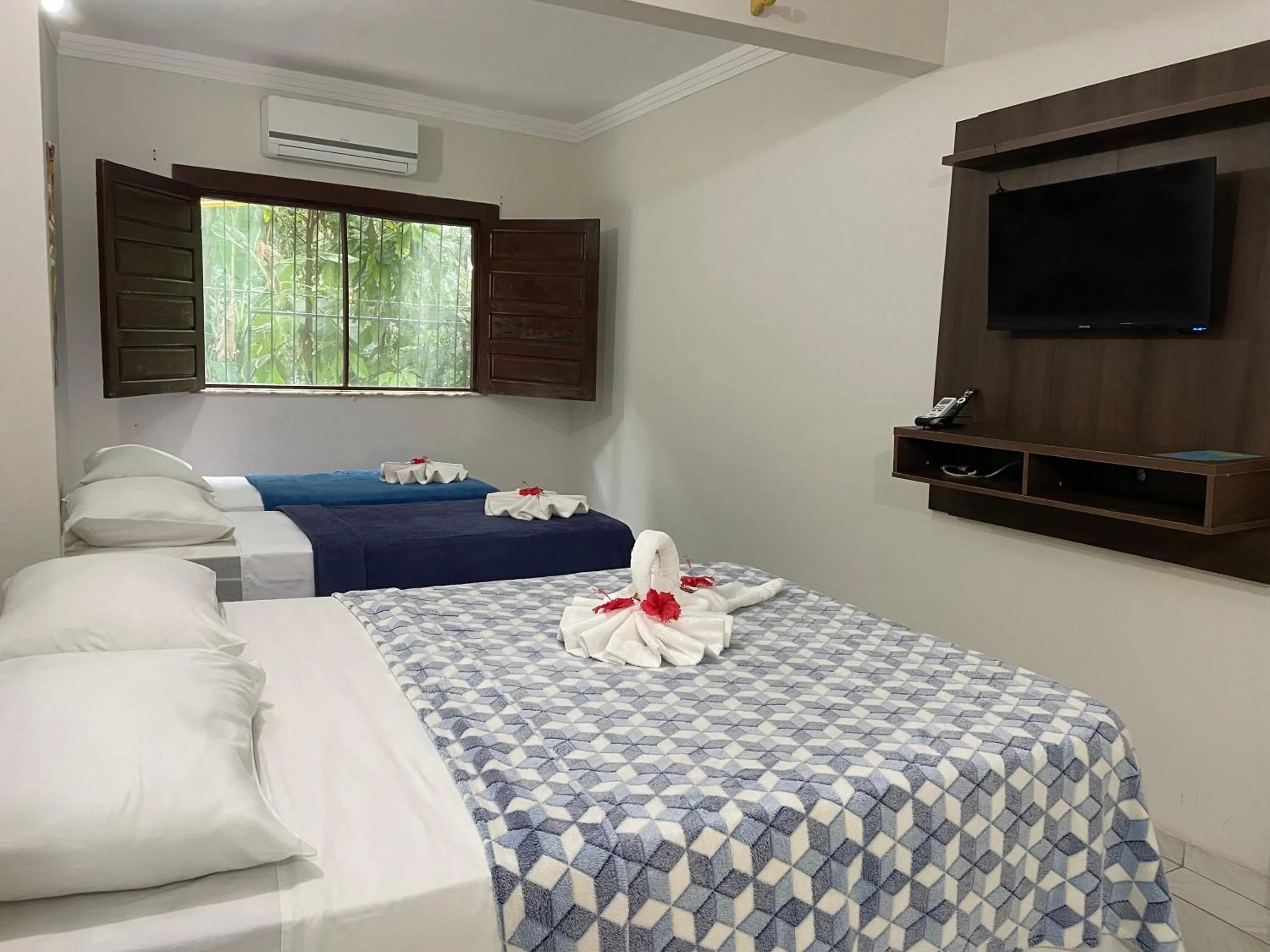 Bed in Pousada Vôo da Águia